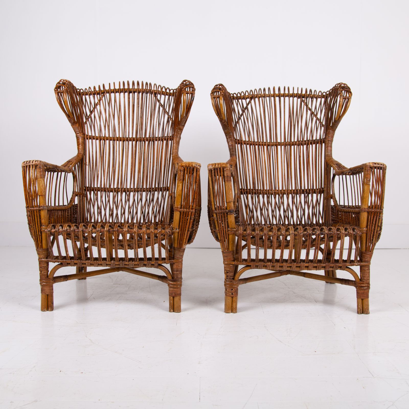 photo vintage Pair Mid Century Italian Wicker & Bamboo Wingback Armchairs Fratelli Castano Milan C1970