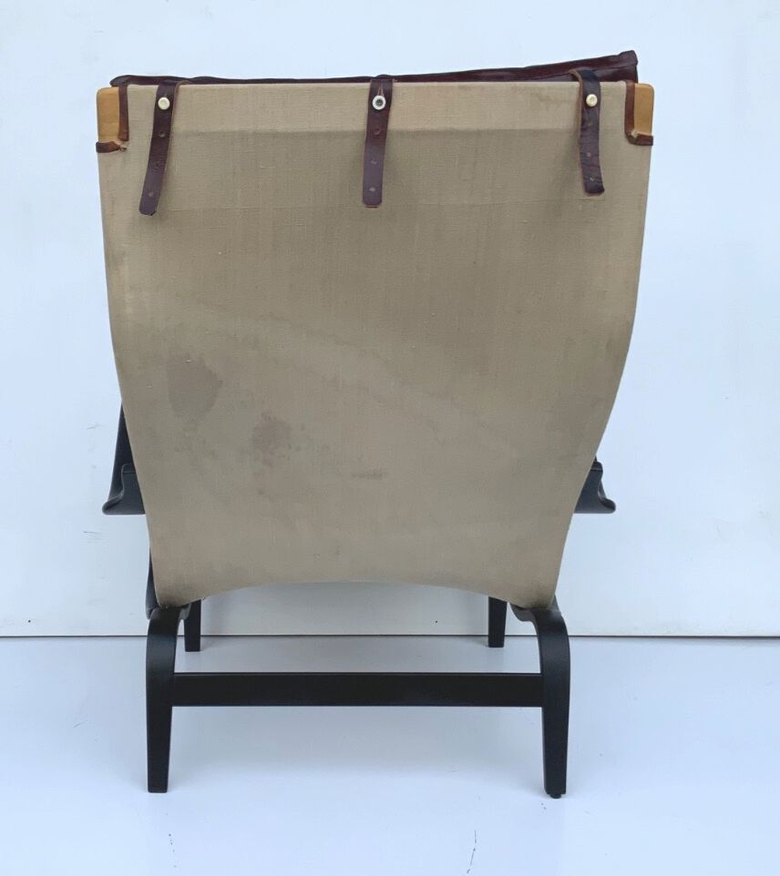photo for sale Vintage Pernilla 69 Armchair By Bruno Mathsson For Dux In Oxblood Leather 1960s