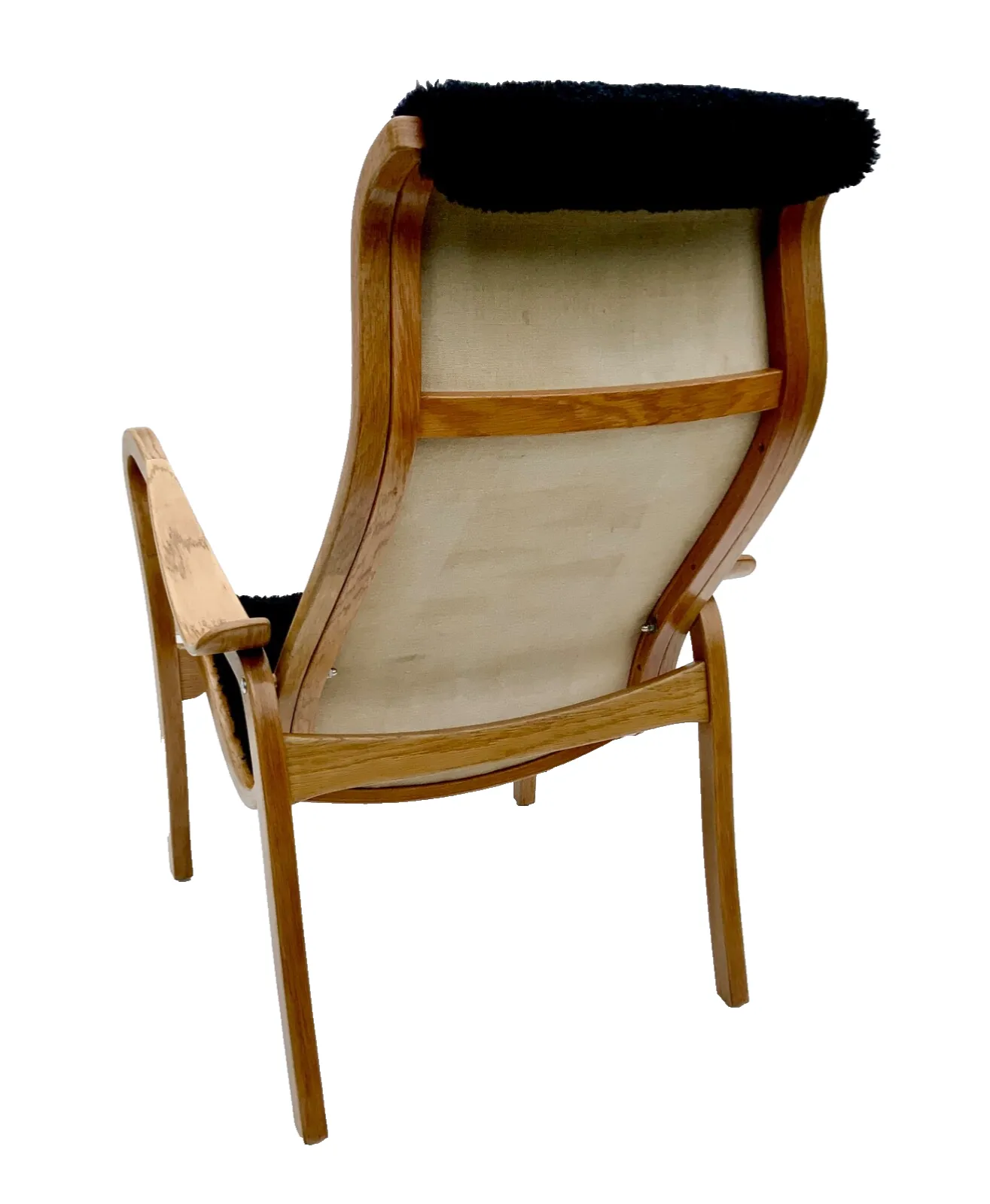 Vintage G.A. Berg “Torparen” Armchair, Oak, Black Sheepskin, With Ottoman 1960s photo vinterior
