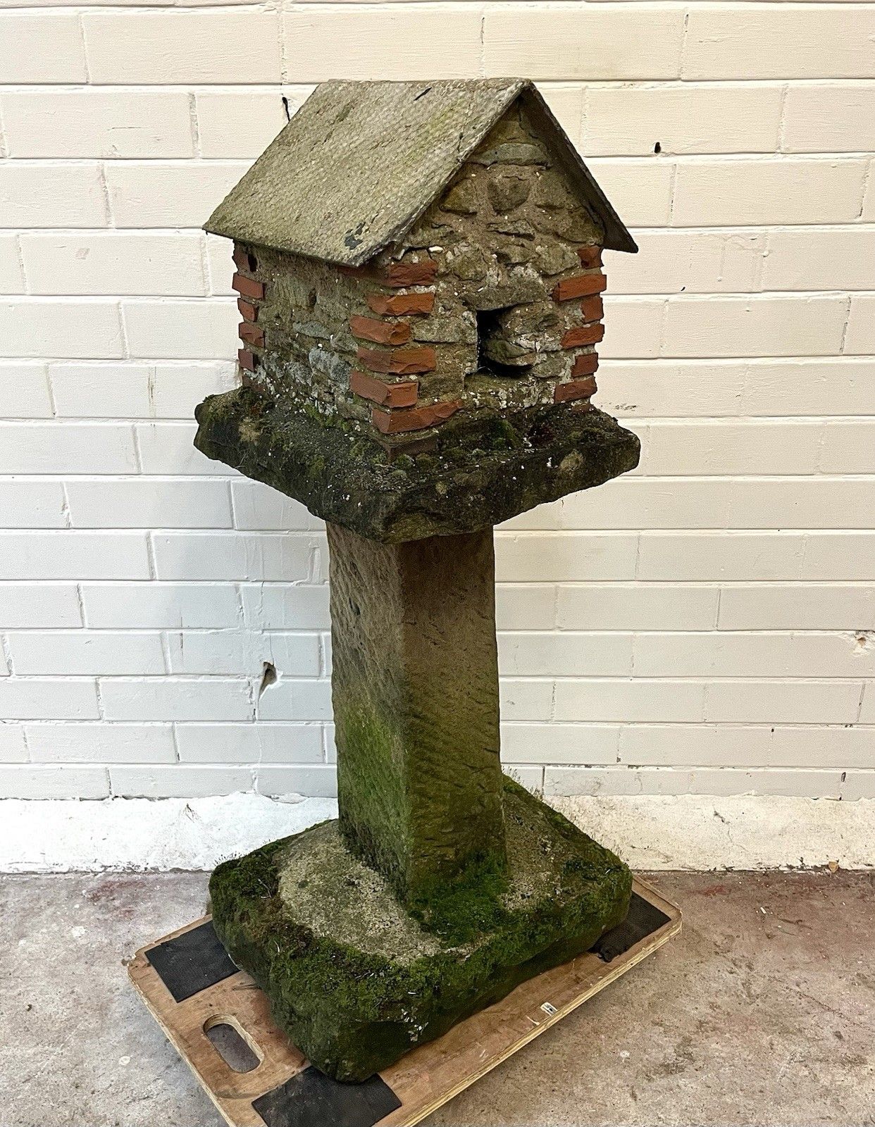 A Charming Folk Art Stone Garden Birdhouse Made From Stone.