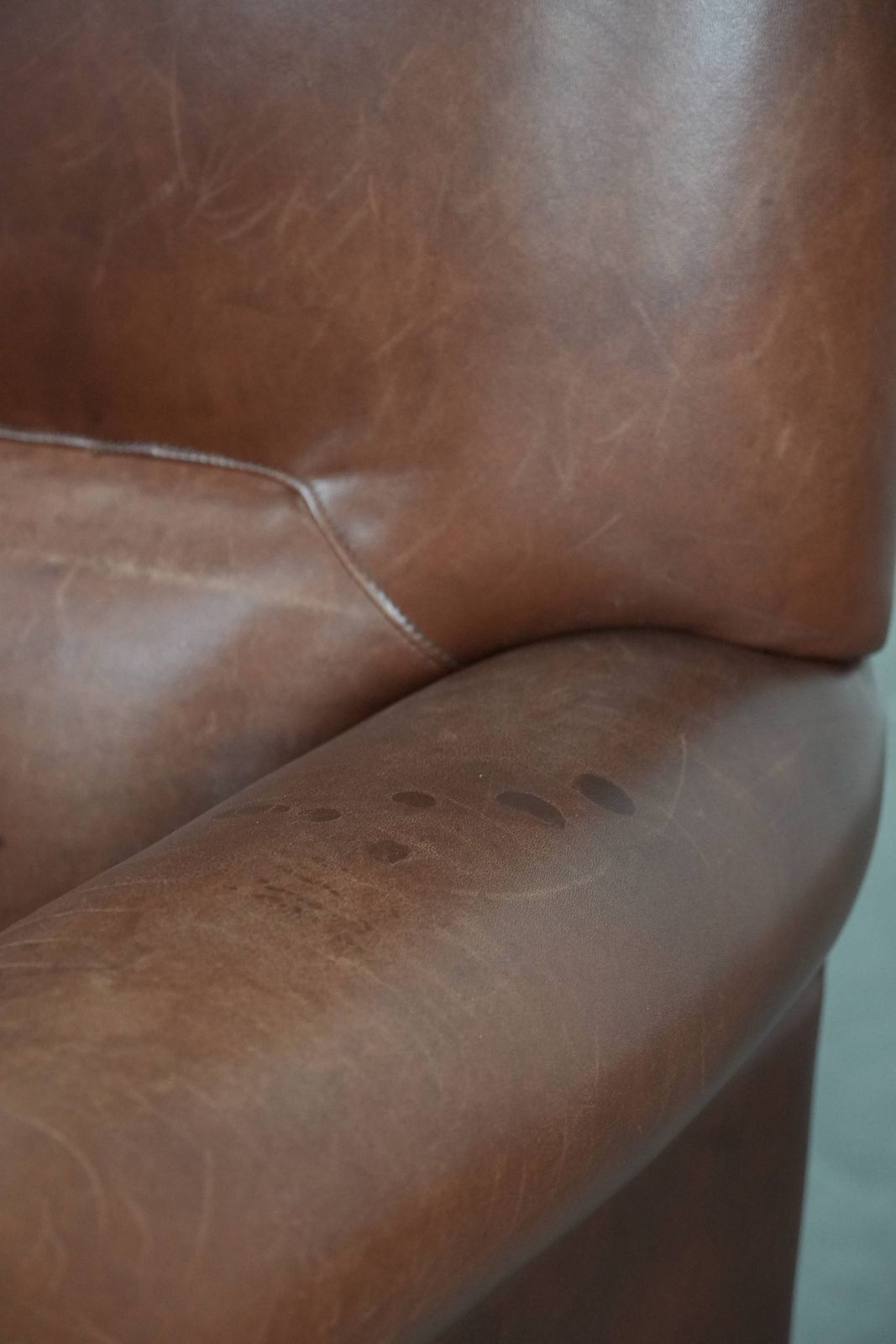 864.0 Nice And Comfortable Armchair Made Of Cognac Colored Cowhide In English Style photo