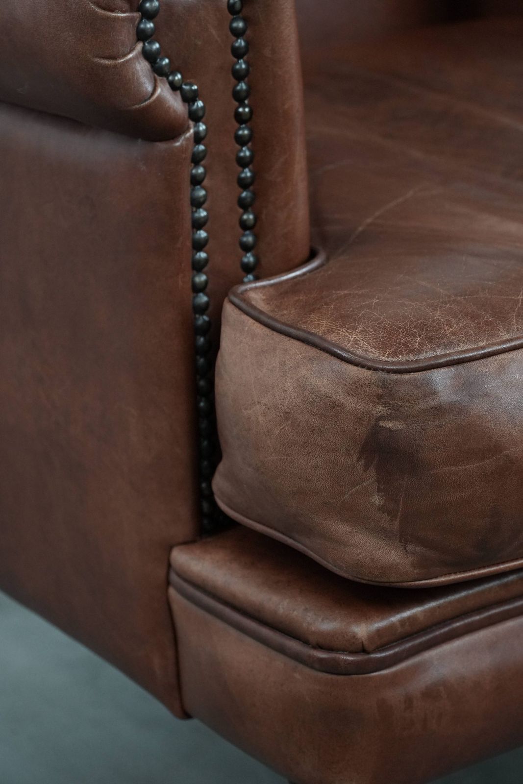 photo buy Nice And Comfortable Armchair Made Of Cognac Colored Cowhide In English Style