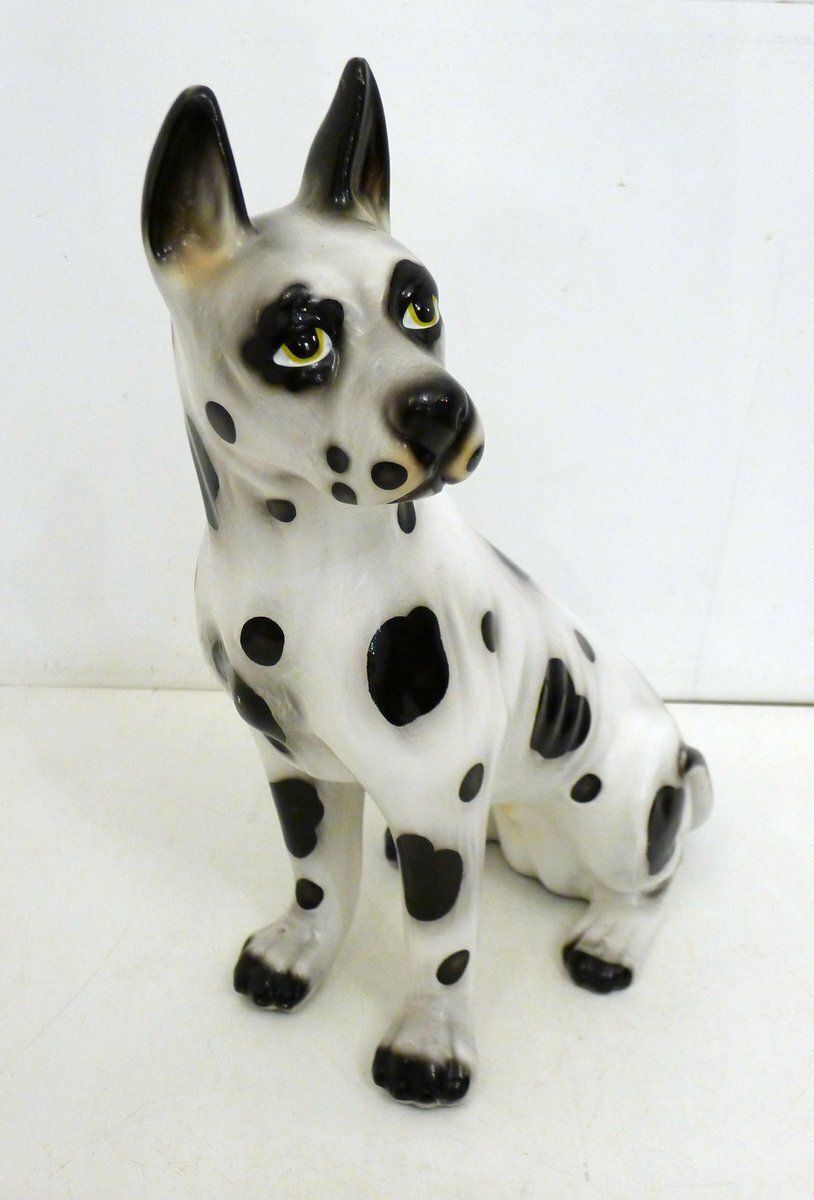 Large Ceramic Sculpture Of A Seated Black And White Dog, 1970s photo furniture