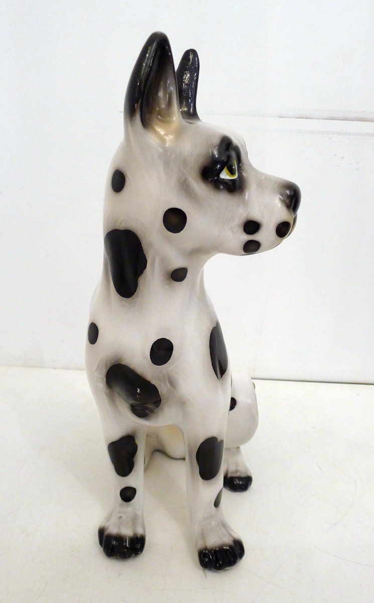 Large Ceramic Sculpture Of A Seated Black And White Dog, 1970s photo vintage