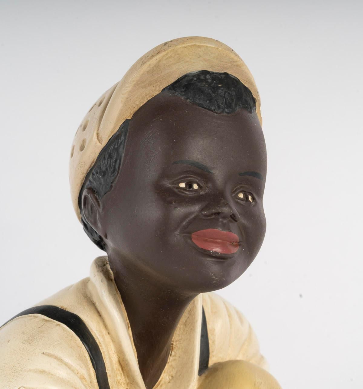 Painted Plaster Sculpture Of A Child Playing, 20th Century. photo for sale