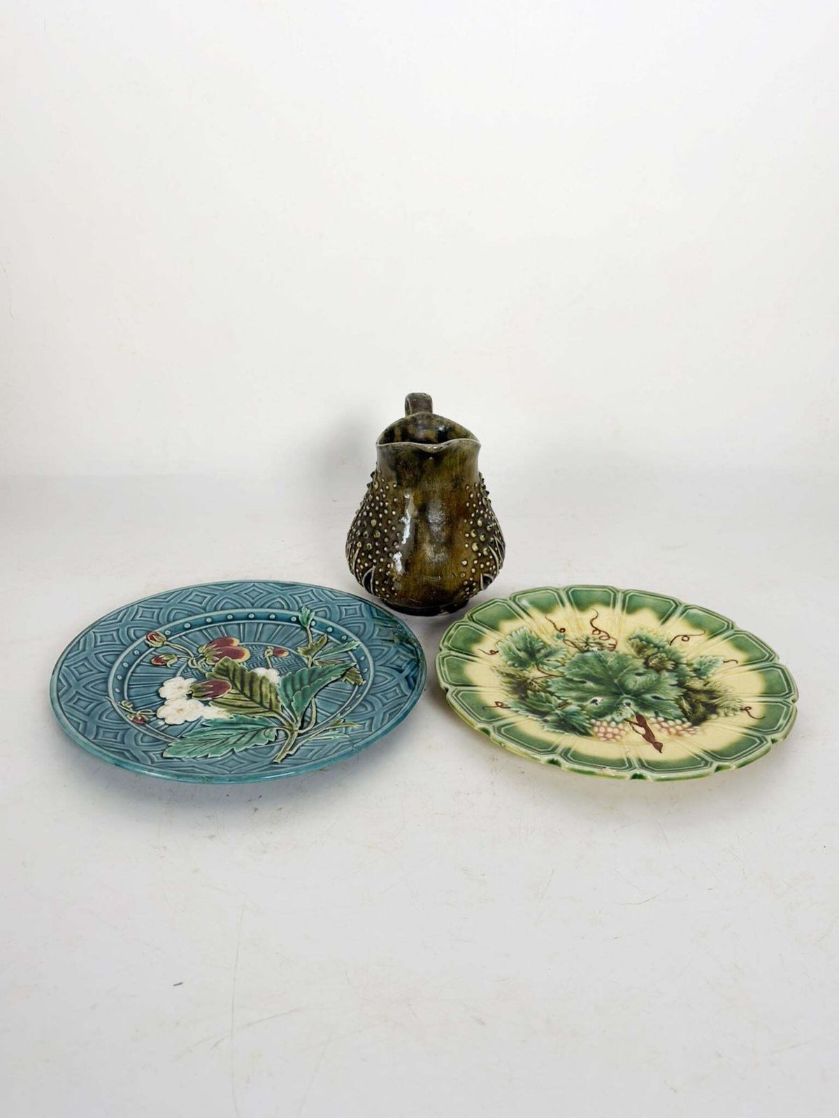 Set Of Majolica Plates Signed With Floral Motifs And A Pitcher photo furniture