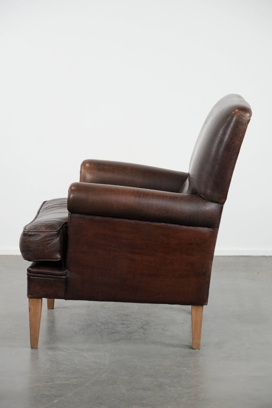 Characterful Sheepskin Armchair With A Beautiful Deep Color photo 1086.0