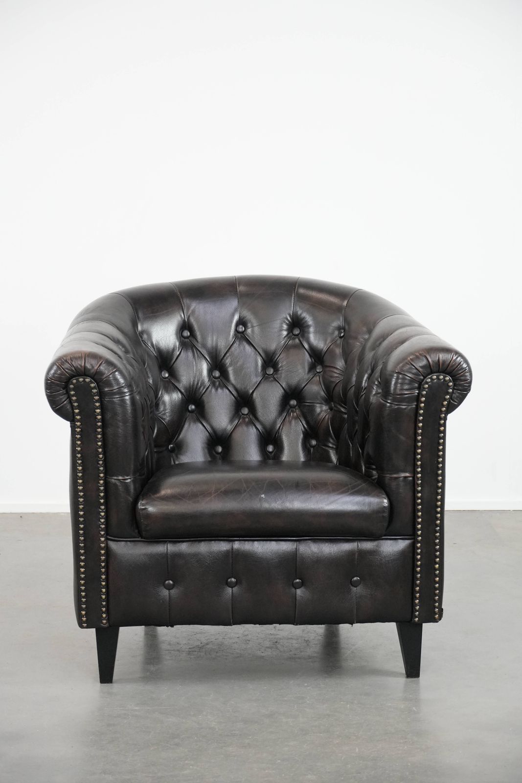 Dark Luxurious Cowhide Chesterfield Club Armchair In English Style, Finished With Decorative Nails photo furniture
