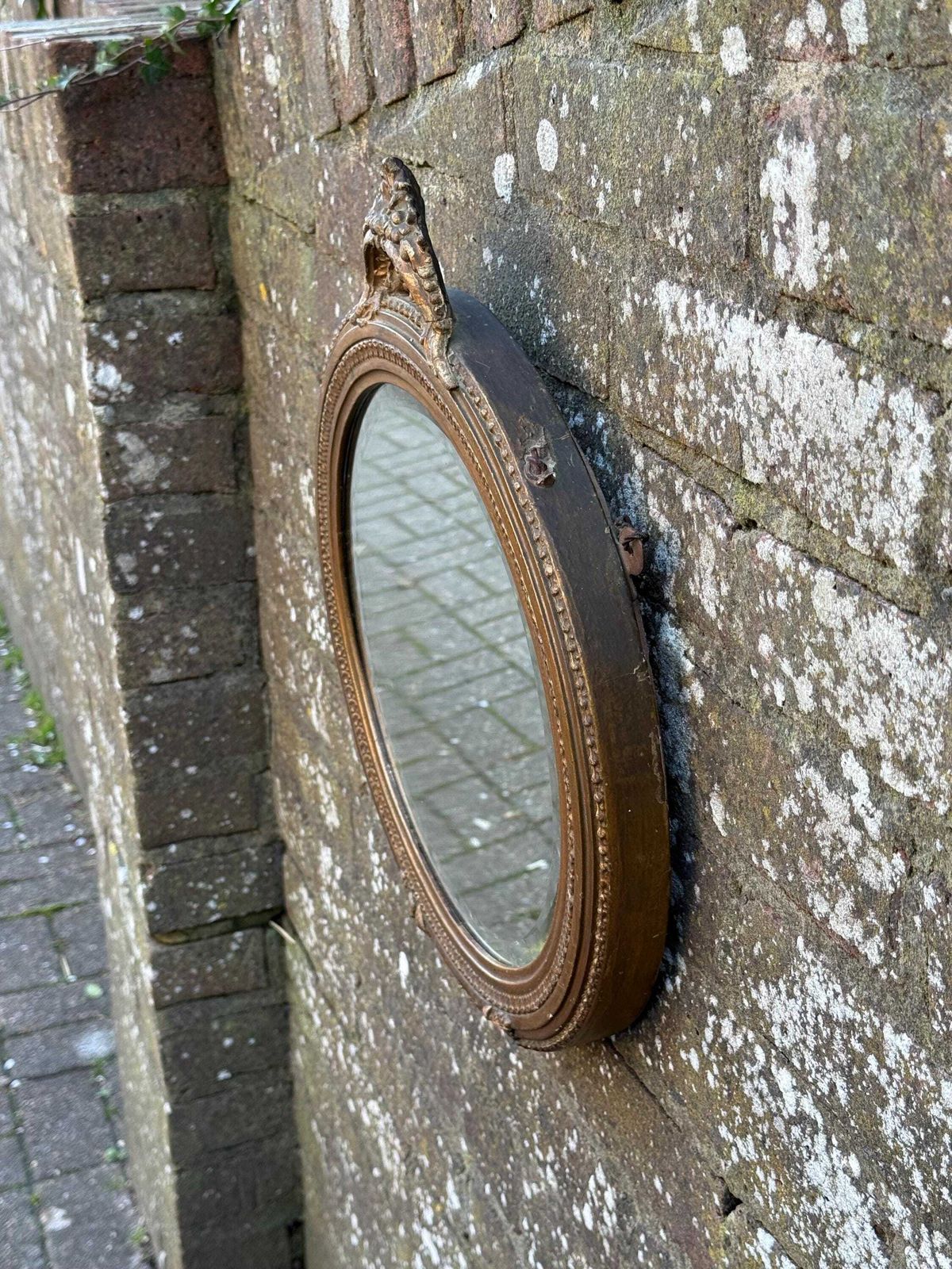 photo vintage Antique Ornate Gesso Gilt Wall Mirror With Ornate Crest Detail And Shabbied Finish