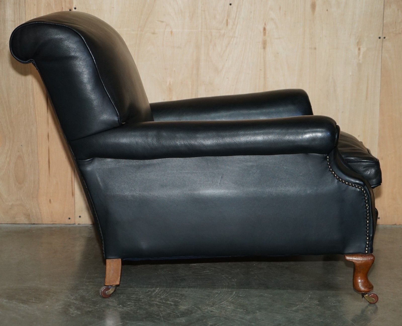 photo for sale Oversized Antique Victorian Black Leather Club Armchair Stamped Inside Back Leg