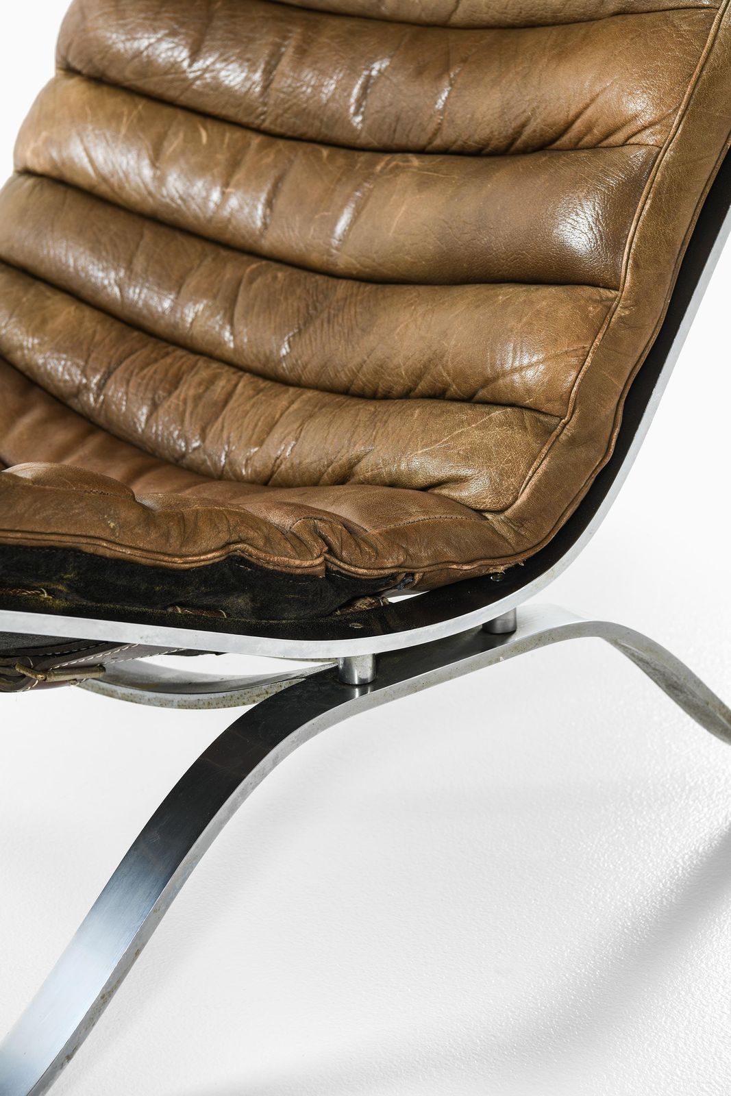 Easy Chair In Leather And Steel With Stool By Arne Norell, 1970s photo for sale
