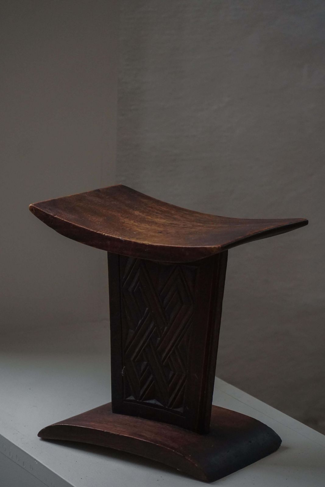 African Sculptural Hardwood Stool, Curved Seat And Architectural Base, 1970s photo furniture
