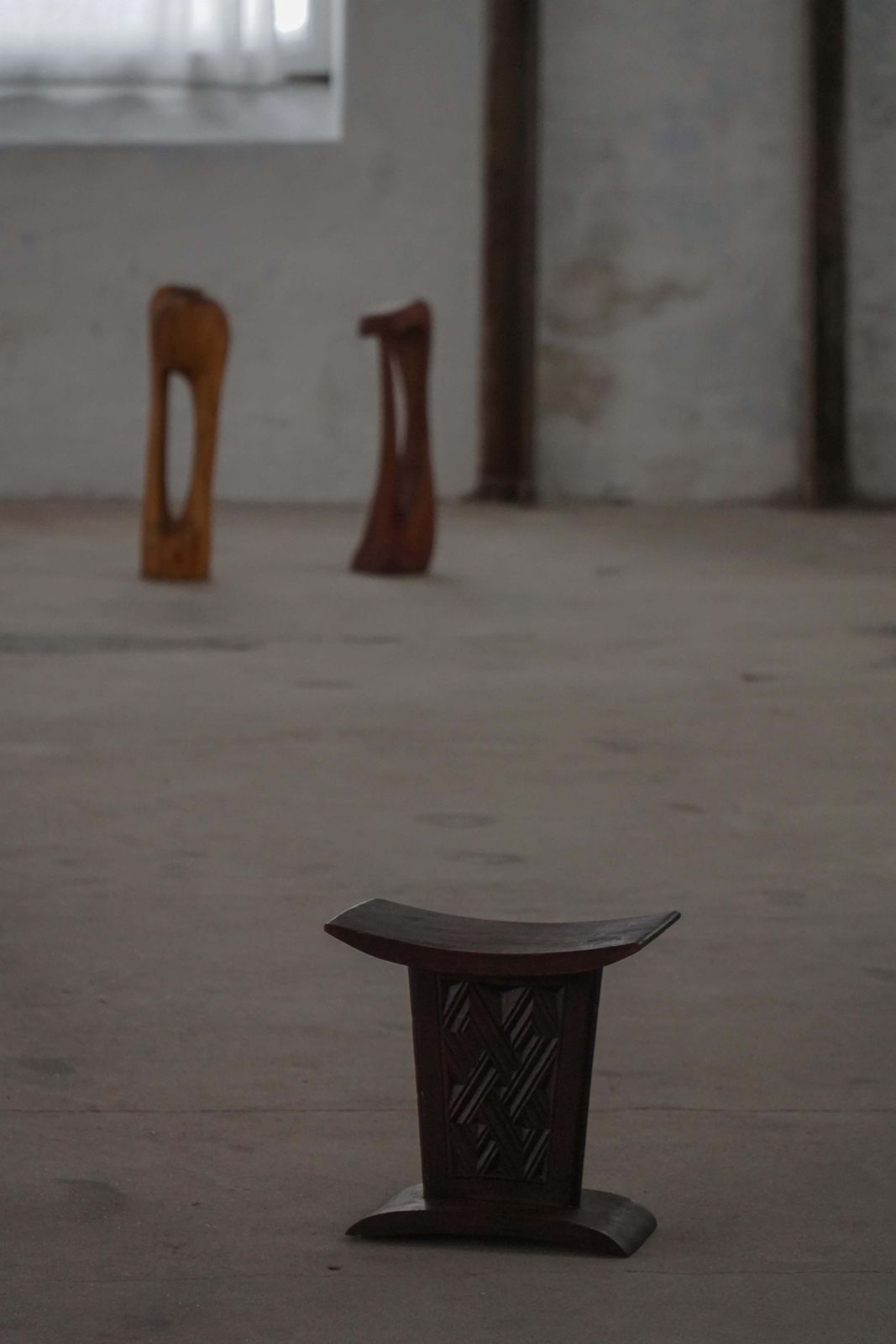 African Sculptural Hardwood Stool, Curved Seat And Architectural Base, 1970s photo for sale