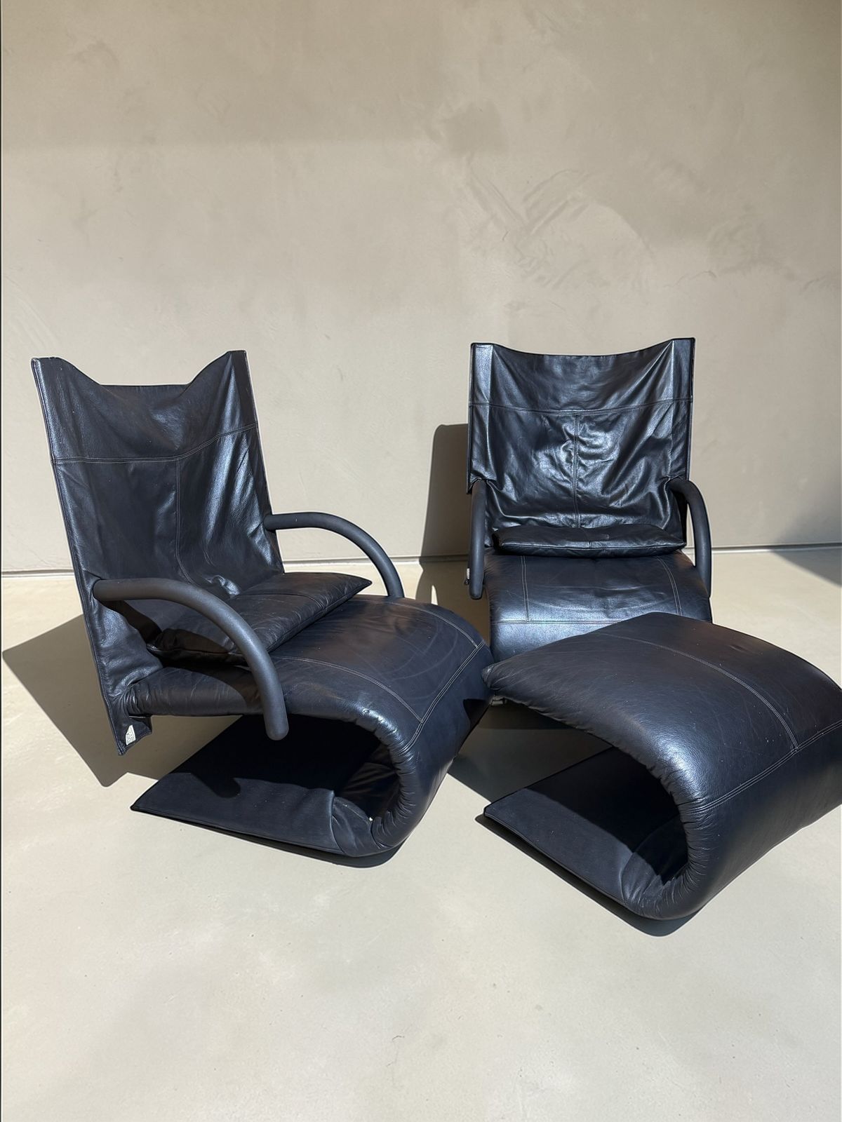 Pair Of Ligne Rosset Zen Leather Chairs – With Ottoman. photo furniture