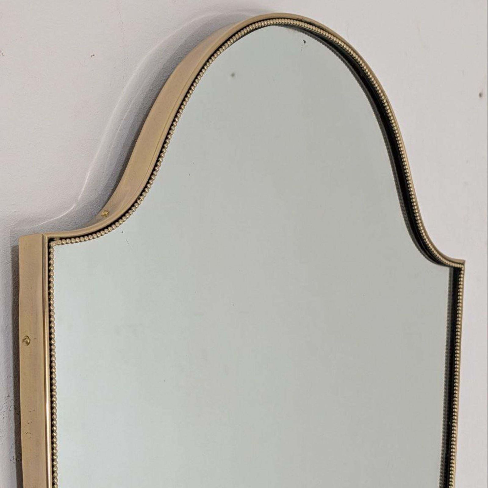 1950s Mid Century Modern Italian Brass Shield Shaped Mirror In The Style Of Gio photo 1405.0
