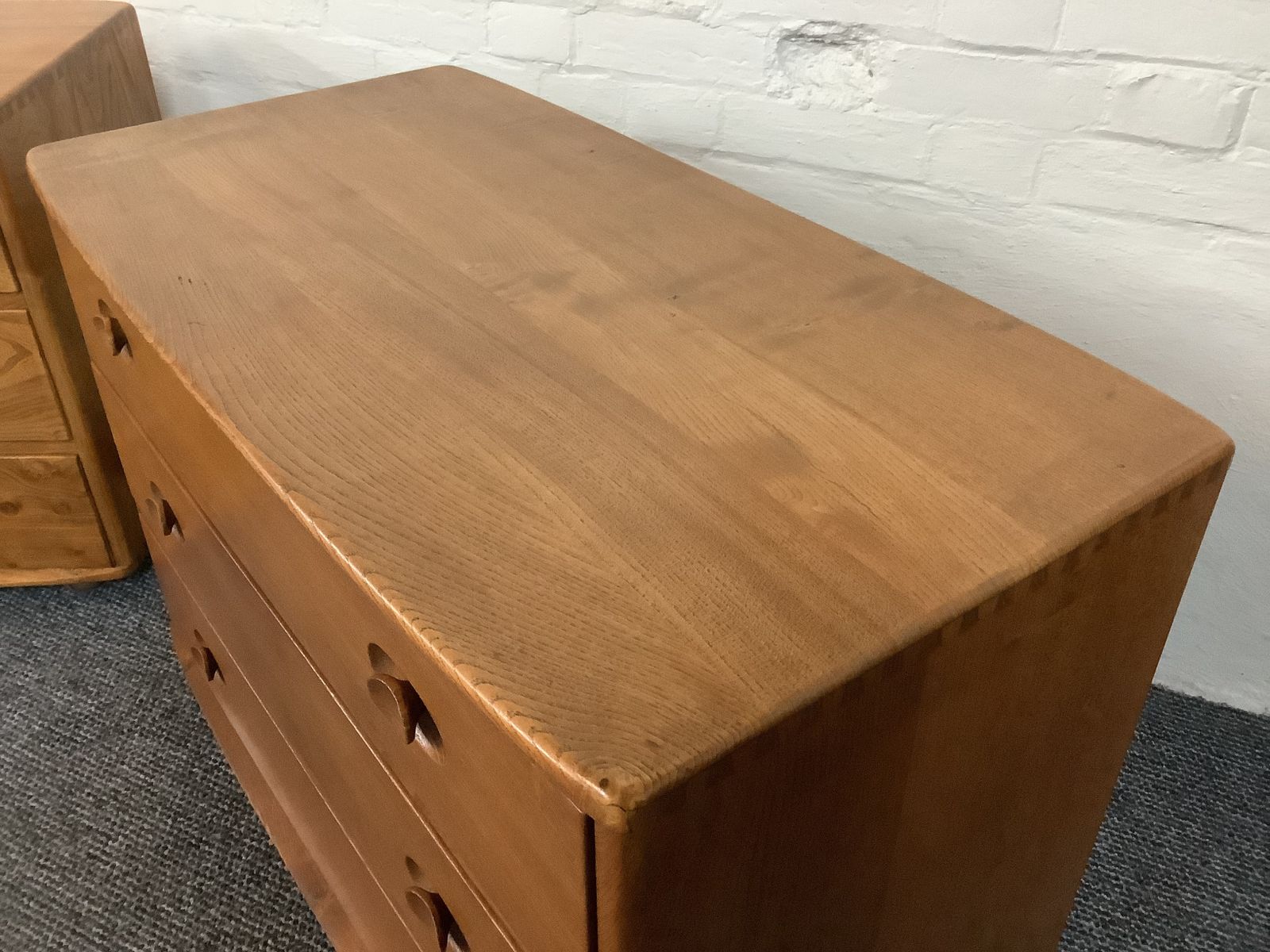 photo furniture Pair Of Ercol 412 Windsor Chest Of Drawers In Natural Elm Finish.