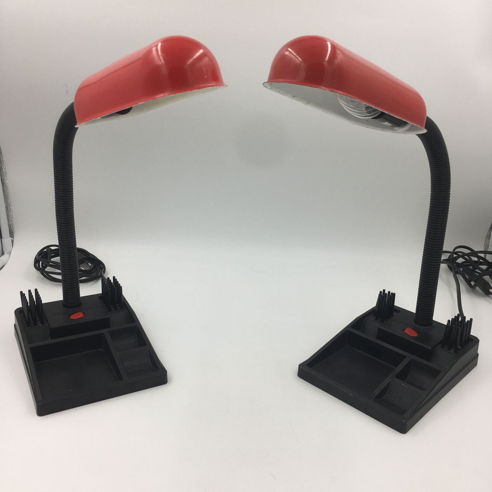 photo buy Duo Of Red And Black Flexible Desk Lamps With Pencil Holder