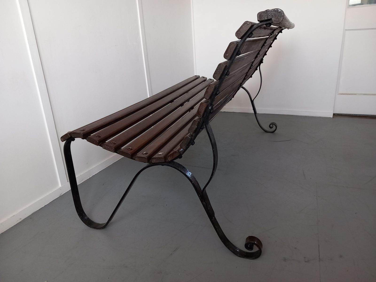A Wrought Iron Garden Bench, 1900s photo furniture