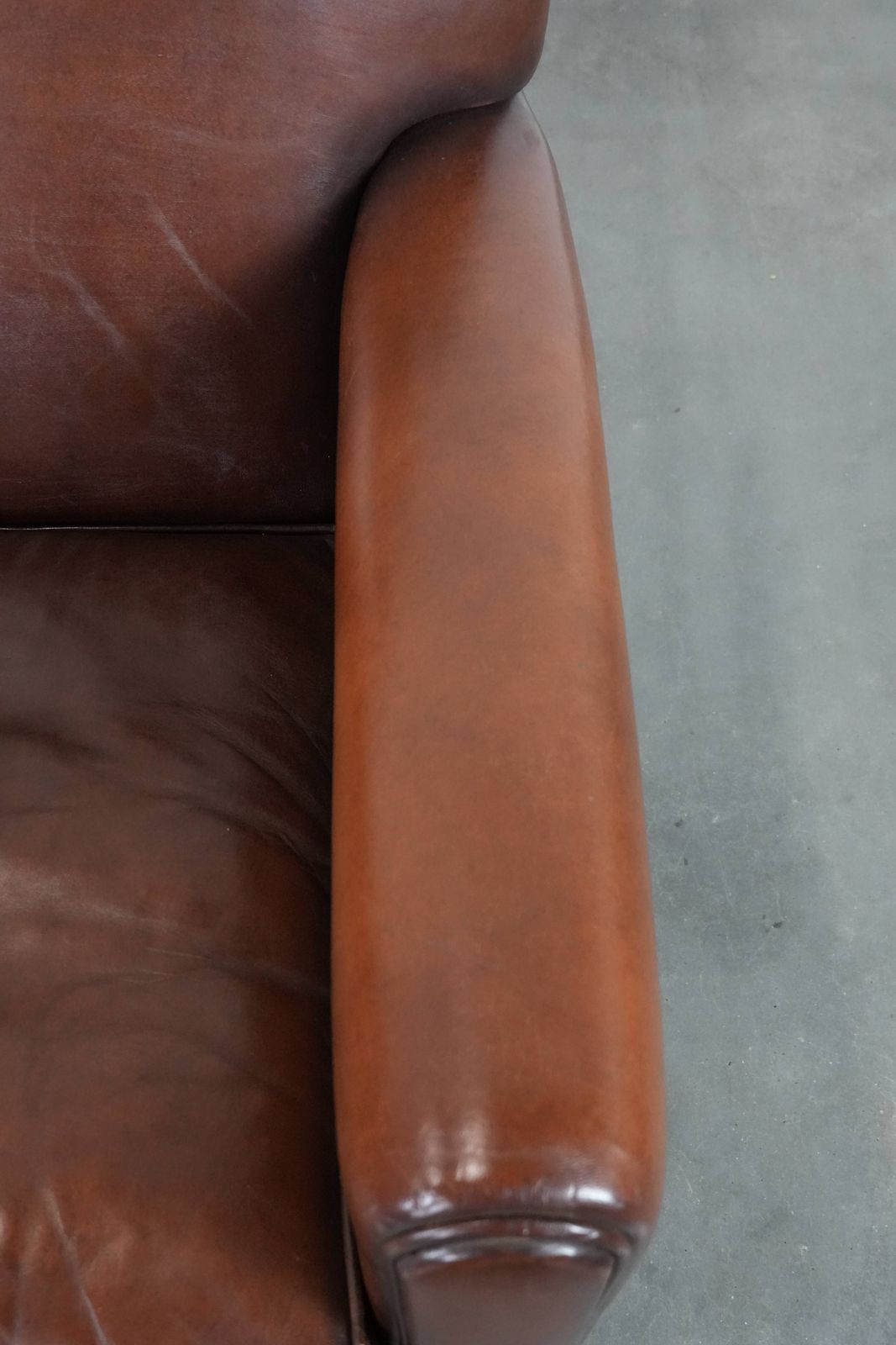 Beautifully Shaped Sheep Leather Art Deco Design Armchair With Timeless And Warm Colors photo vintage