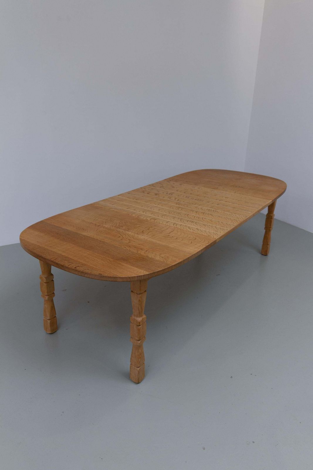 1106.0 Danish Brutalist Oak Extendable Dining Table By Henning Kjærnulf, 1970s. photo