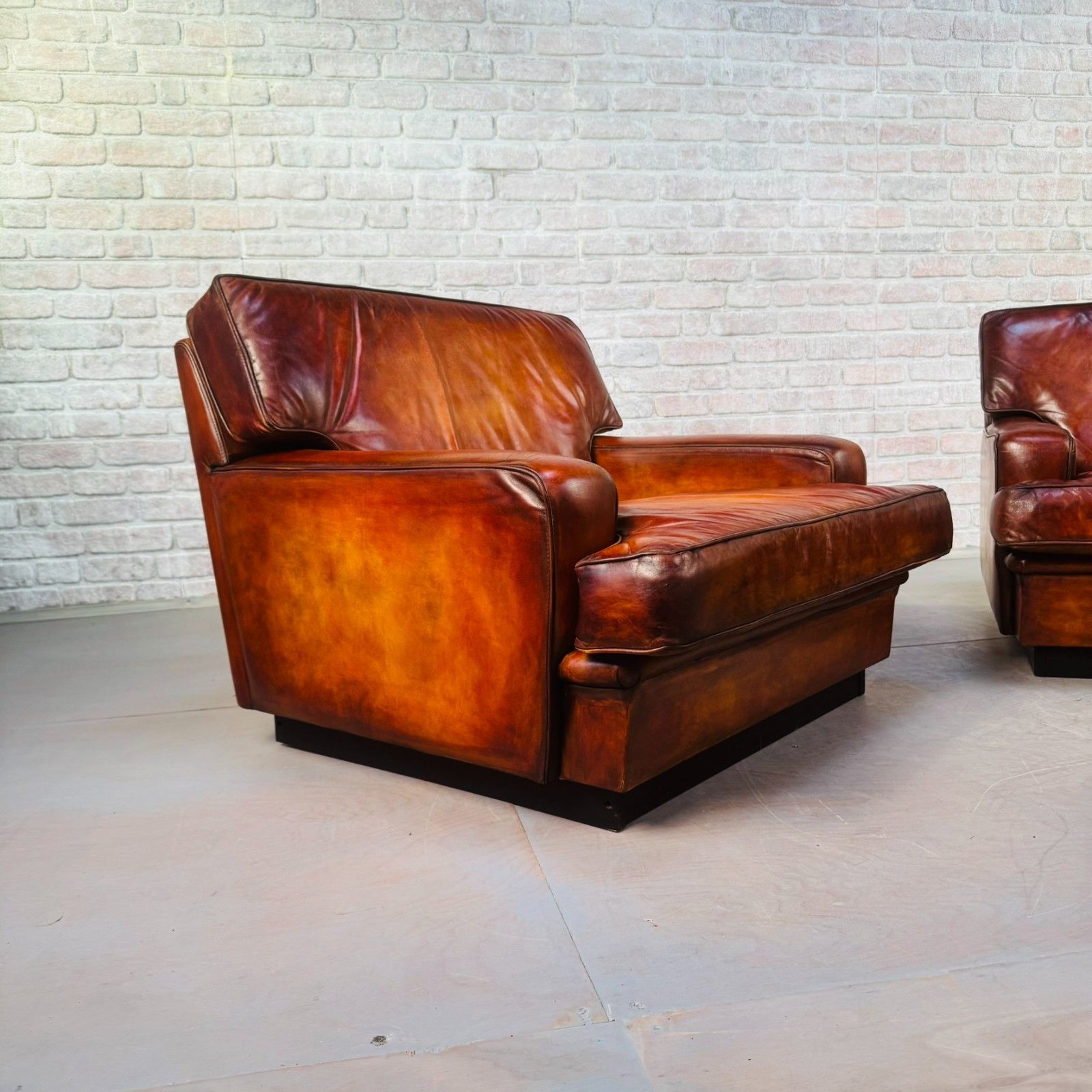 photo for sale Pair Of Arne Norell Swedish Tan Leather Lounge Chairs