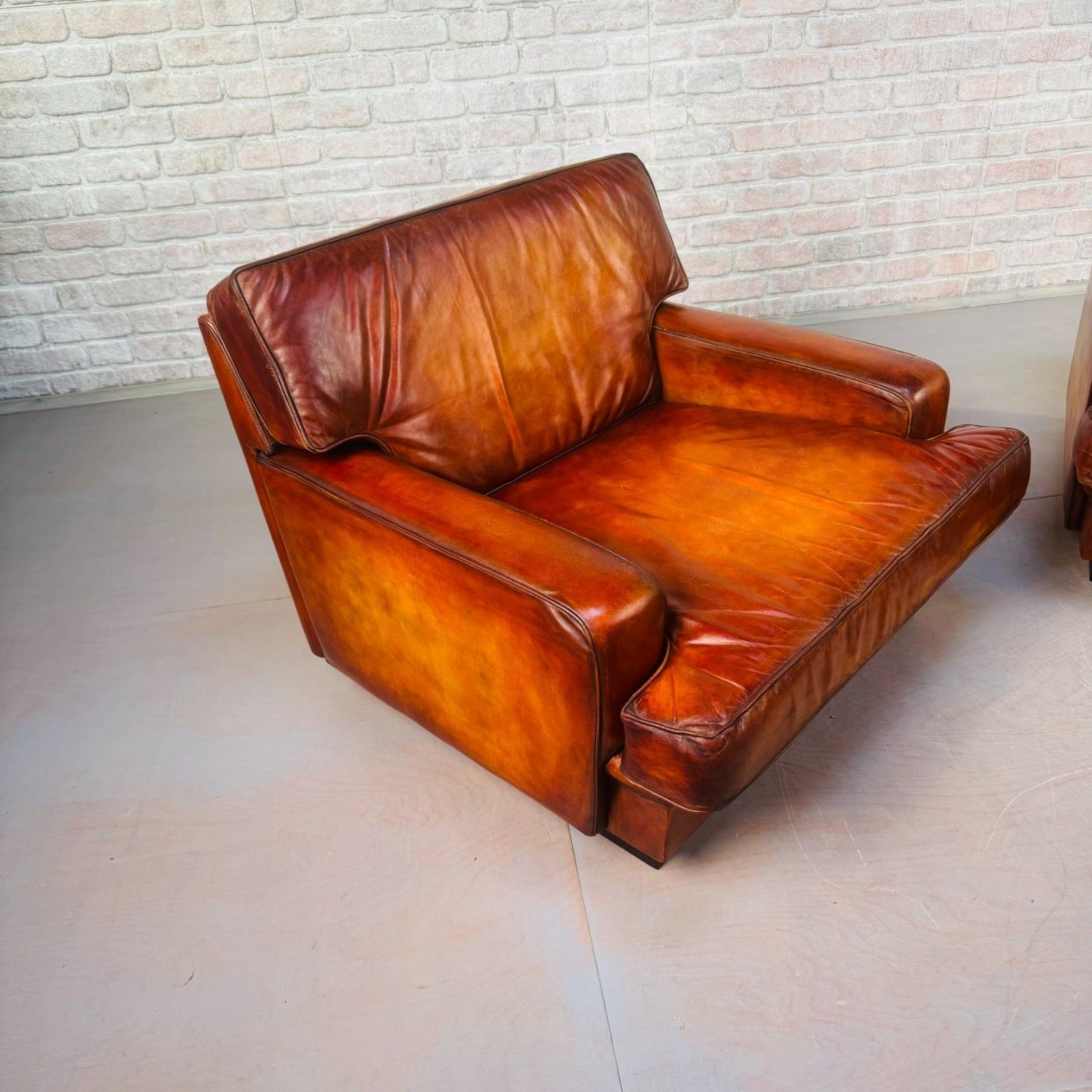photo vinterior Pair Of Arne Norell Swedish Tan Leather Lounge Chairs