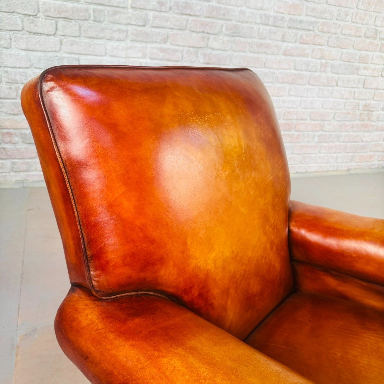 photo for sale Pair Of 1920s English Tan Leather Club Armchairs