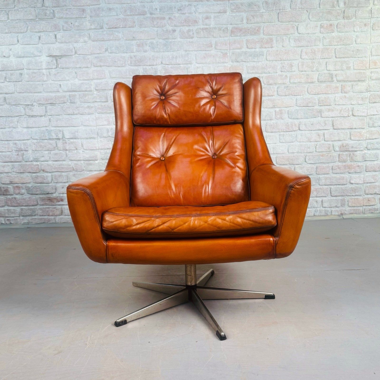 Vintage 1970s Danish Cognac Leather Egg Swivel Chair By Eran photo for sale