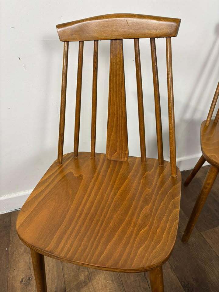 photo furniture Set Of Four Rodanski Mid Century Danish Style Stick Back Dining Chairs