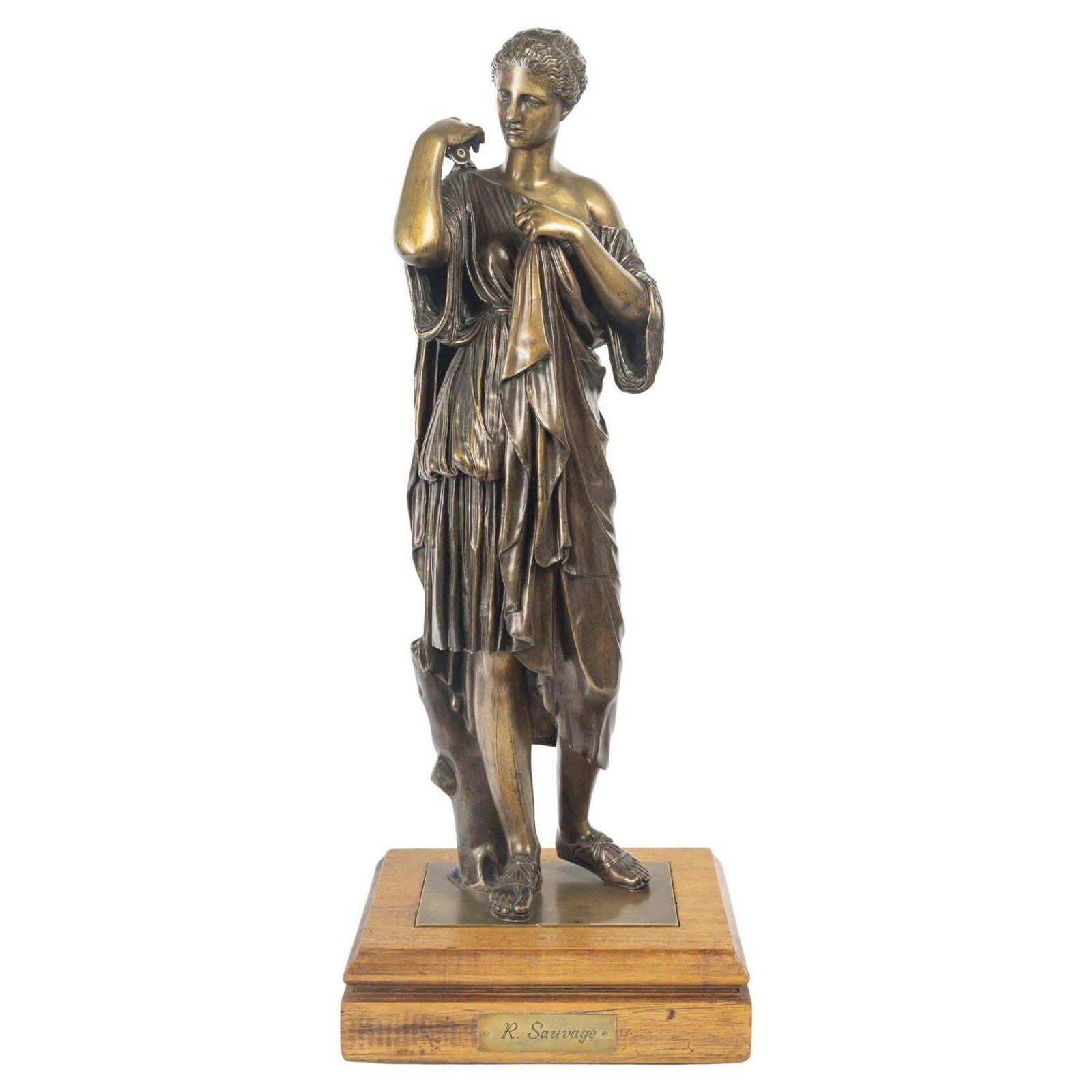 Early 20th Century Patinated Bronze Sculpture Of Diana On A Wooden Base.