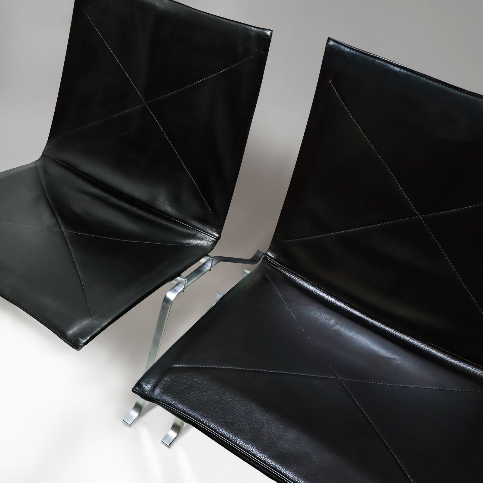 Pair Of Black Leather And Polished Steel Danish Mid Century Poul Kjaerholm Pk22 Lounge Chairs For E. Kold Christensen 1960s. photo 8950.0