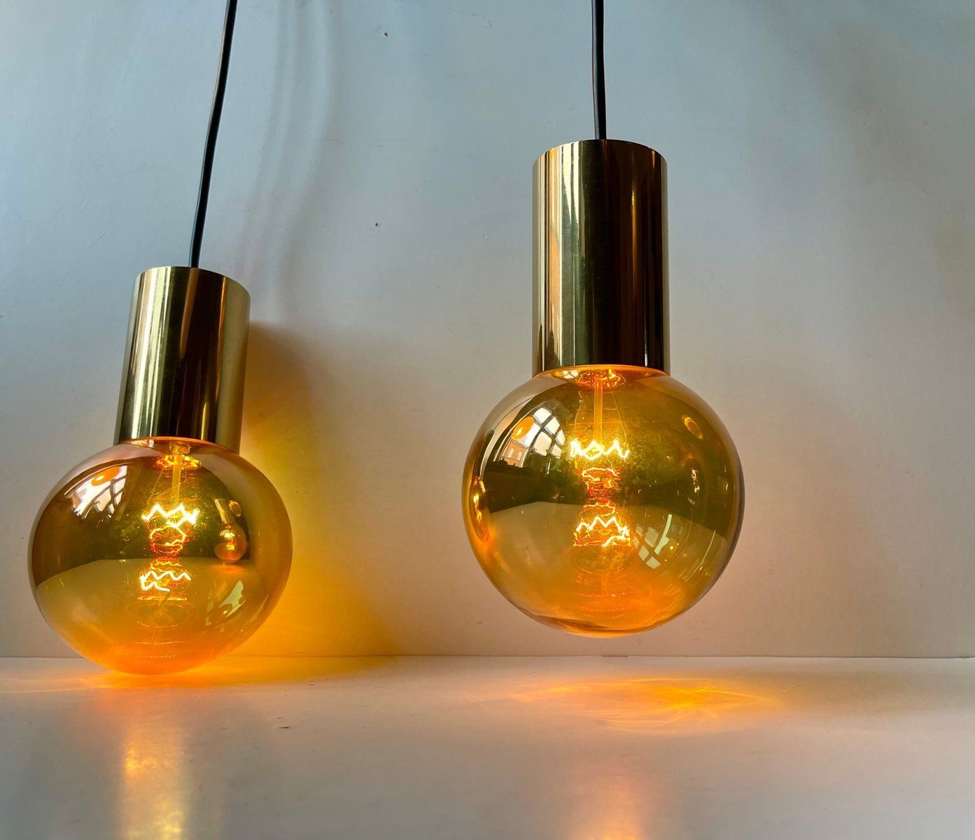 Mid Century Modern Spy Ball Pendant Lamps In Brass From Frimann, 1960s, Set Of 2 photo vinterior