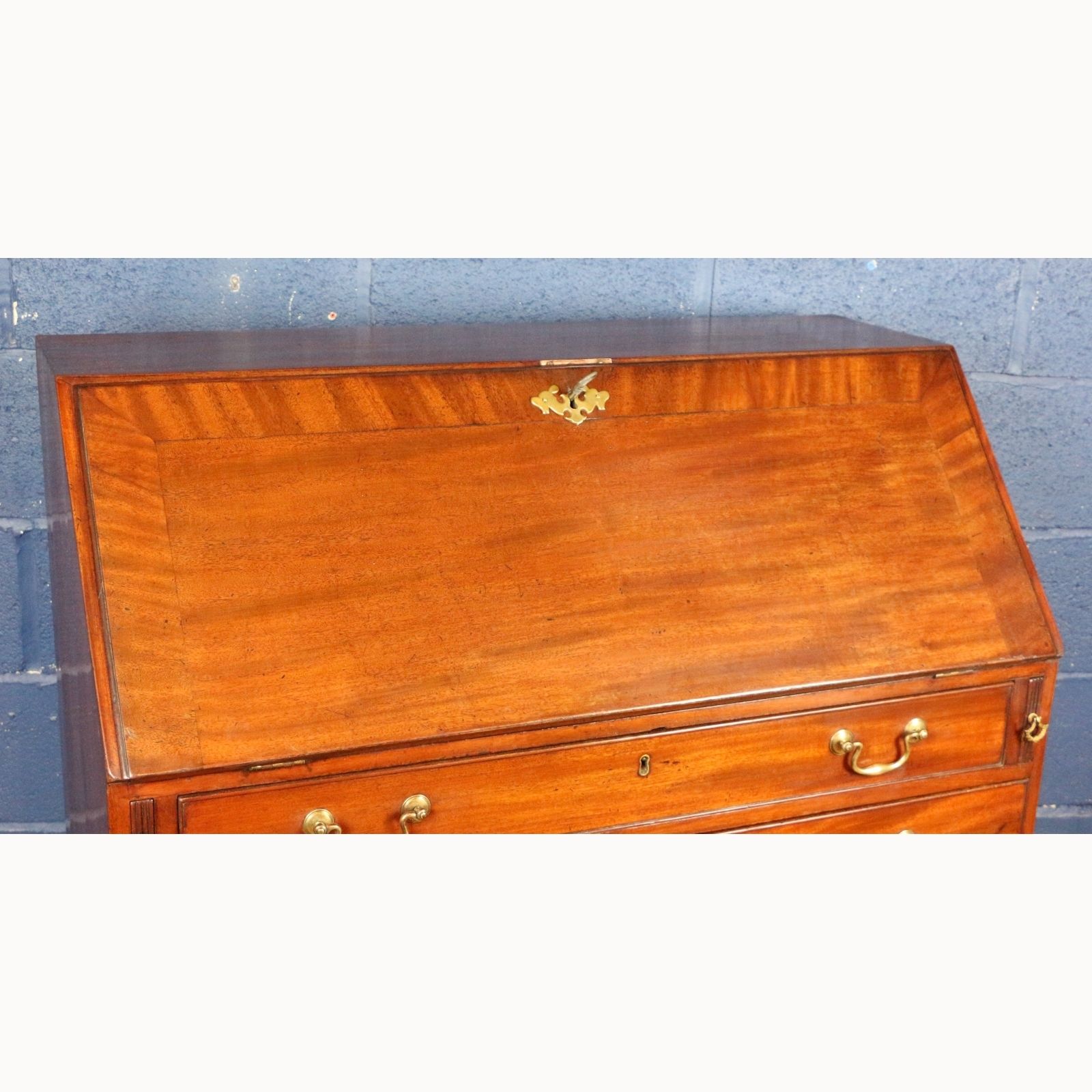 A Georgian Mahogany Fall Front Bureau With Fitted Interior Raised On Bracket Feet photo for sale
