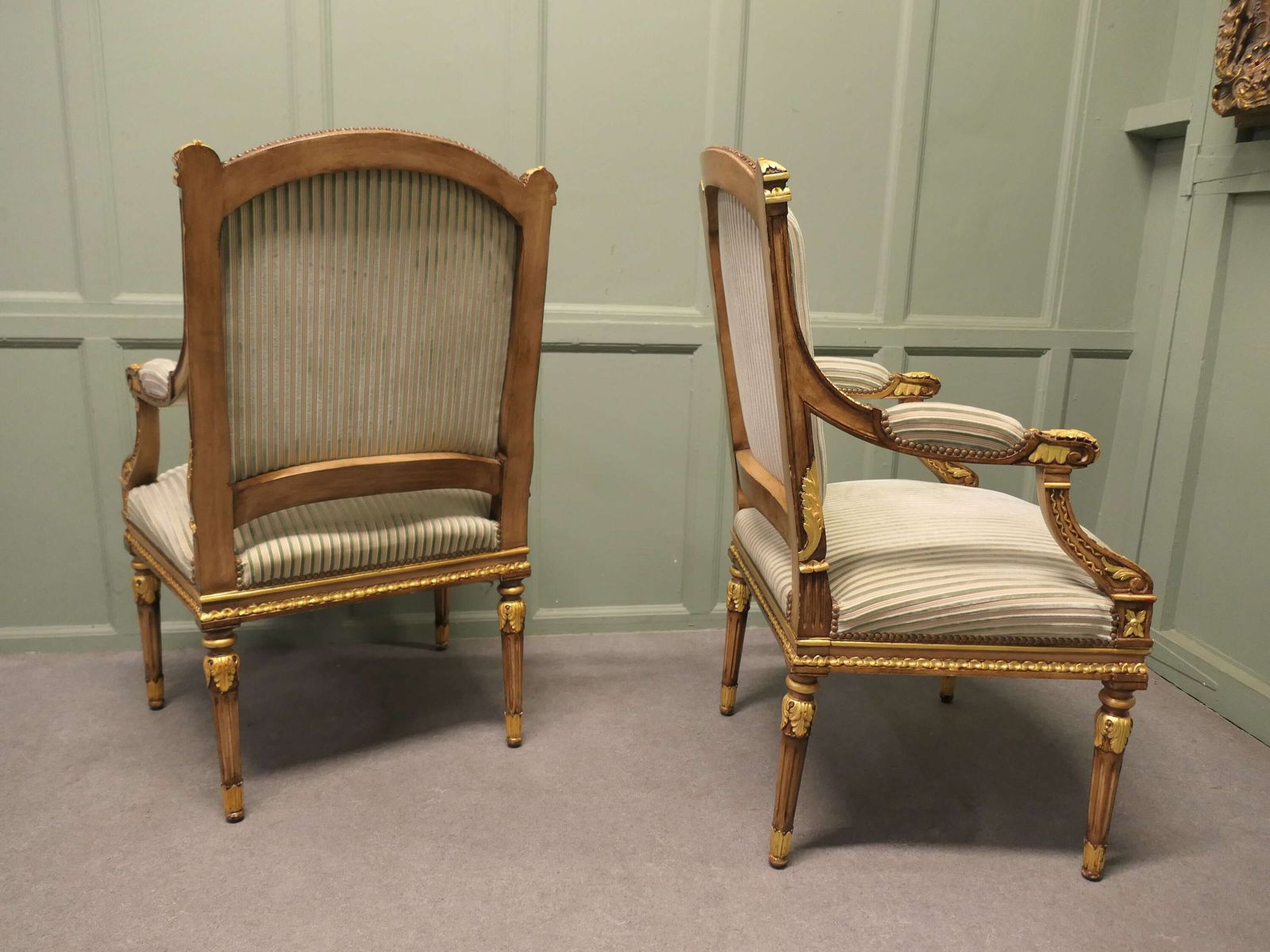 A Pair Of French Regency Style Open Arm Chairs photo buy
