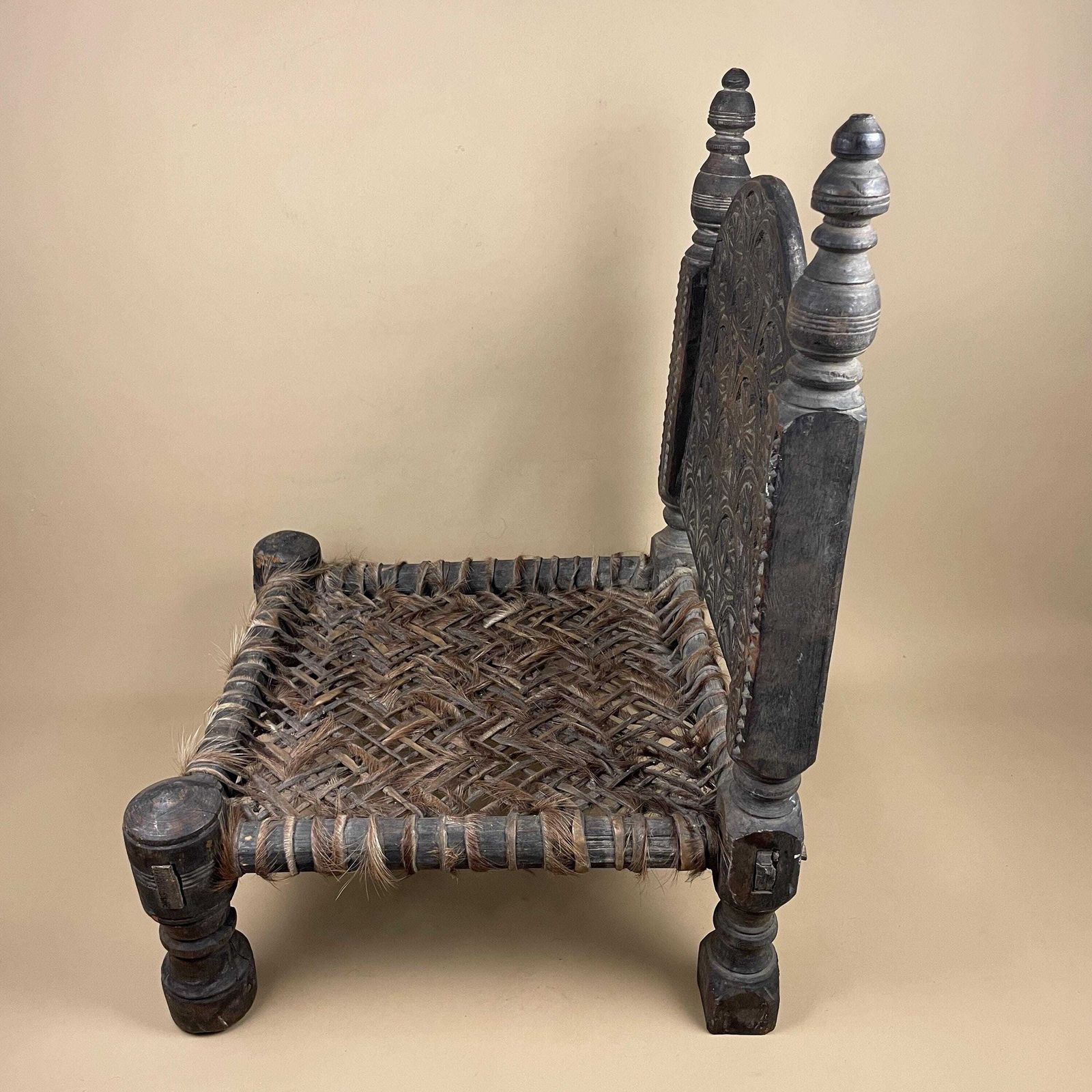 325.0 Indian Hand Carved Chair Low Wedding Seat Woven Cowhide Base Pidha Small Traditional Rajasthan India Rustic Late 19th   Early 20th Century photo