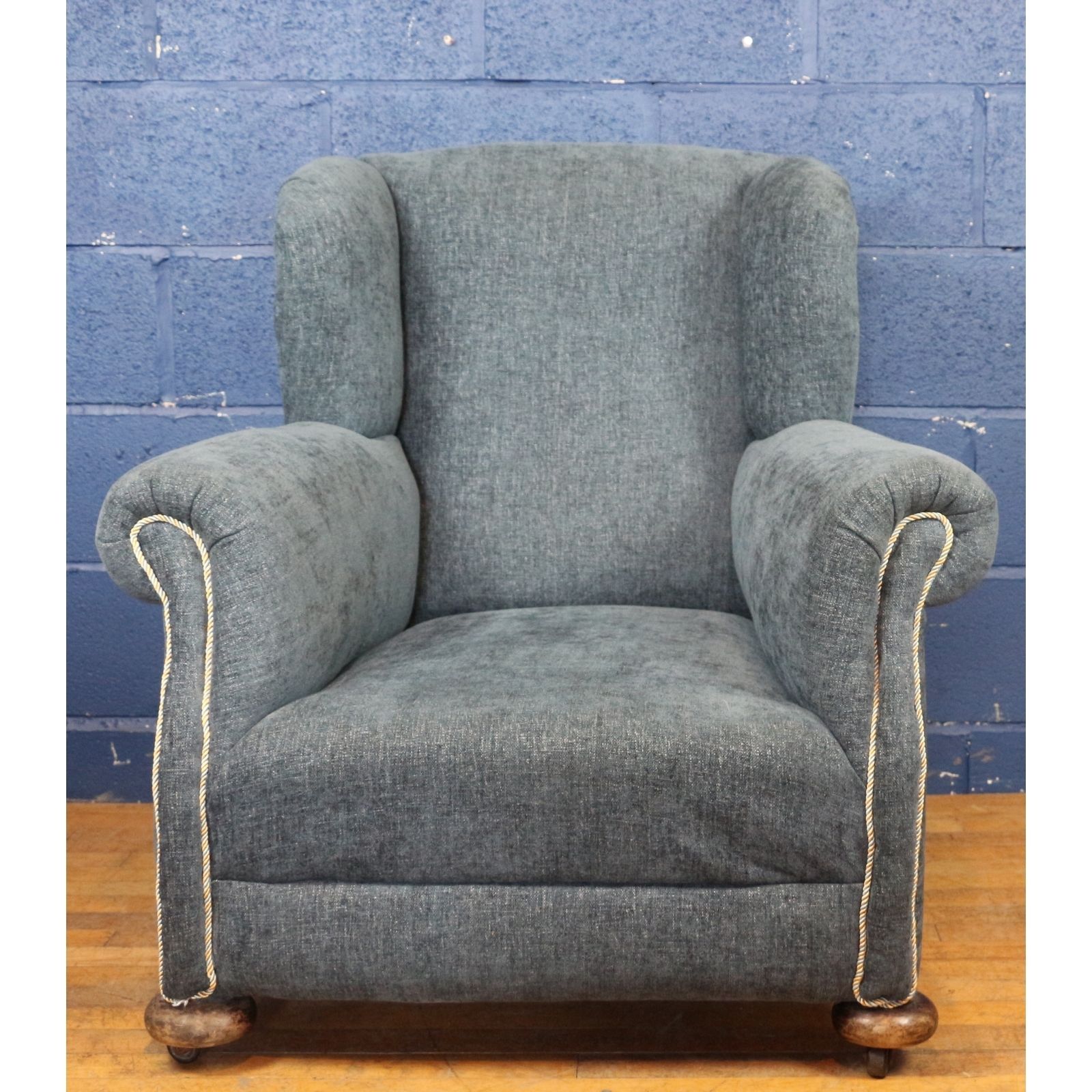 A Large Victorian Freshly Reupholstered Open Wing Arm Chair Raised On Bun Feet photo furniture