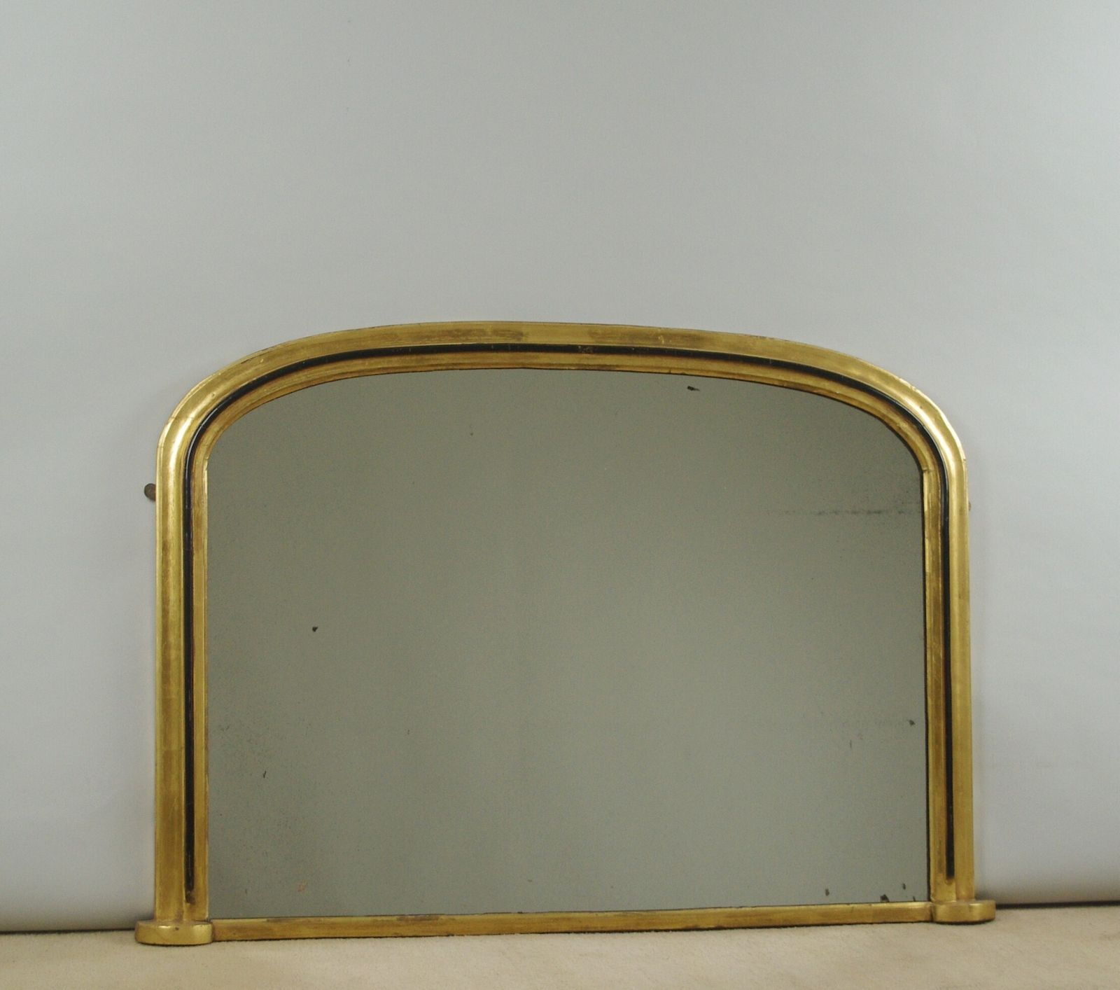 Victorian Gilt And Ebonised Arch Top Overmantle Mirror