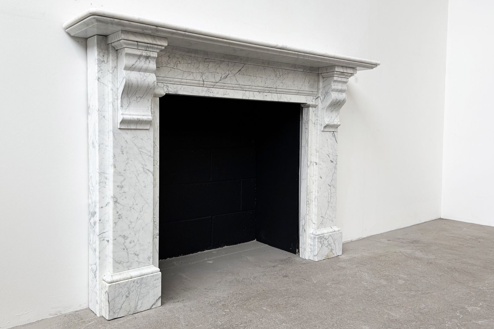 A Substantial Reclaimed Victorian Carrara Marble Fireplace Surround photo for sale