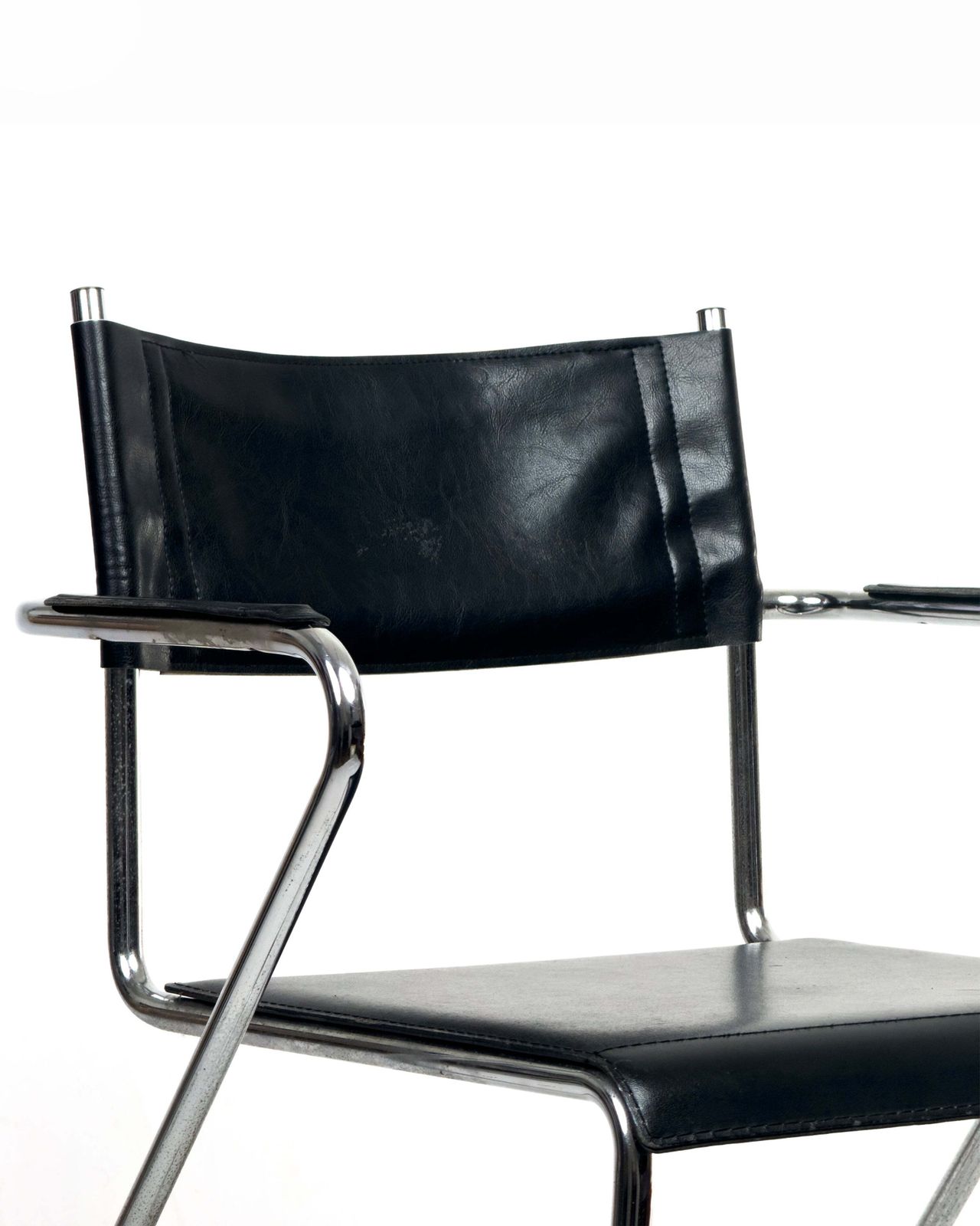 Vintage Cantilever Chair In Black Leather And Chrome. photo Furniture