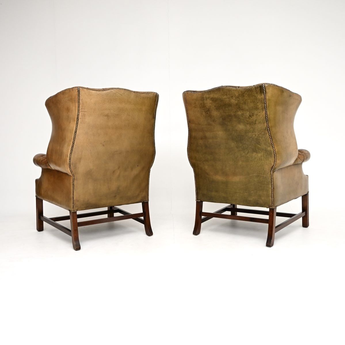photo furniture Pair Of Antique Georgian Style Leather Wing Back Armchairs