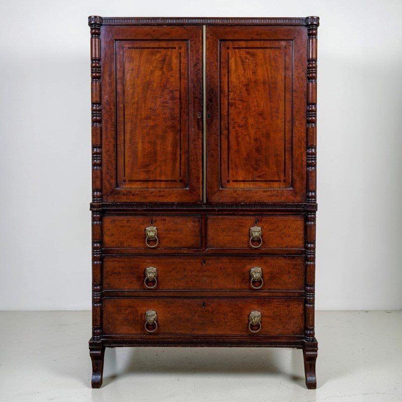 A Regency Mahogany Linen Press Of Rare Smaller Proportions