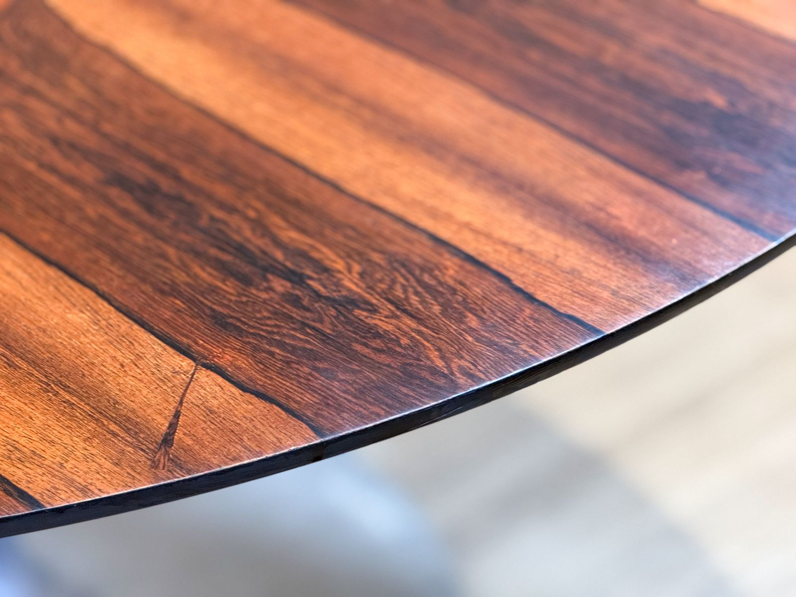 photo furniture Mid Century Arkana Round Dining Table In Brazilian Rosewood