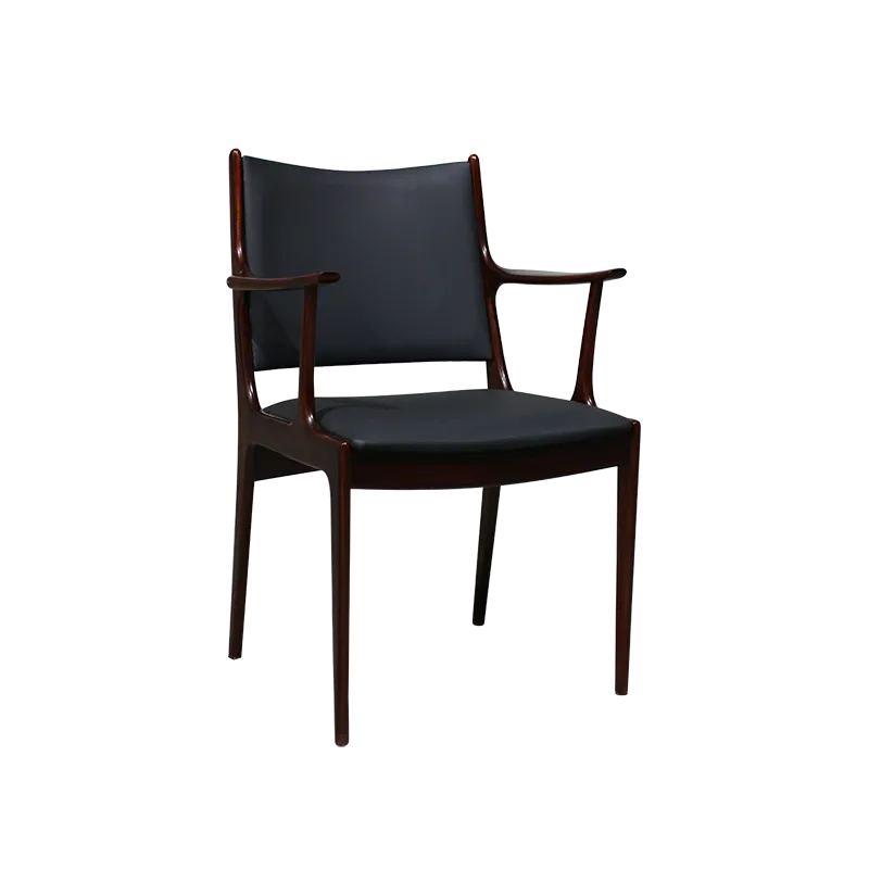 Johannes Andersen Armchair In Mahogany.
