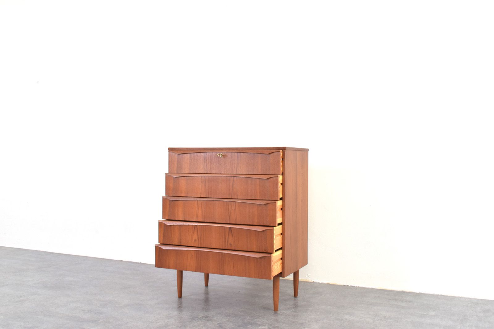 photo for sale Mid Century Danish Teak Chest Of Drawers, 1960s.