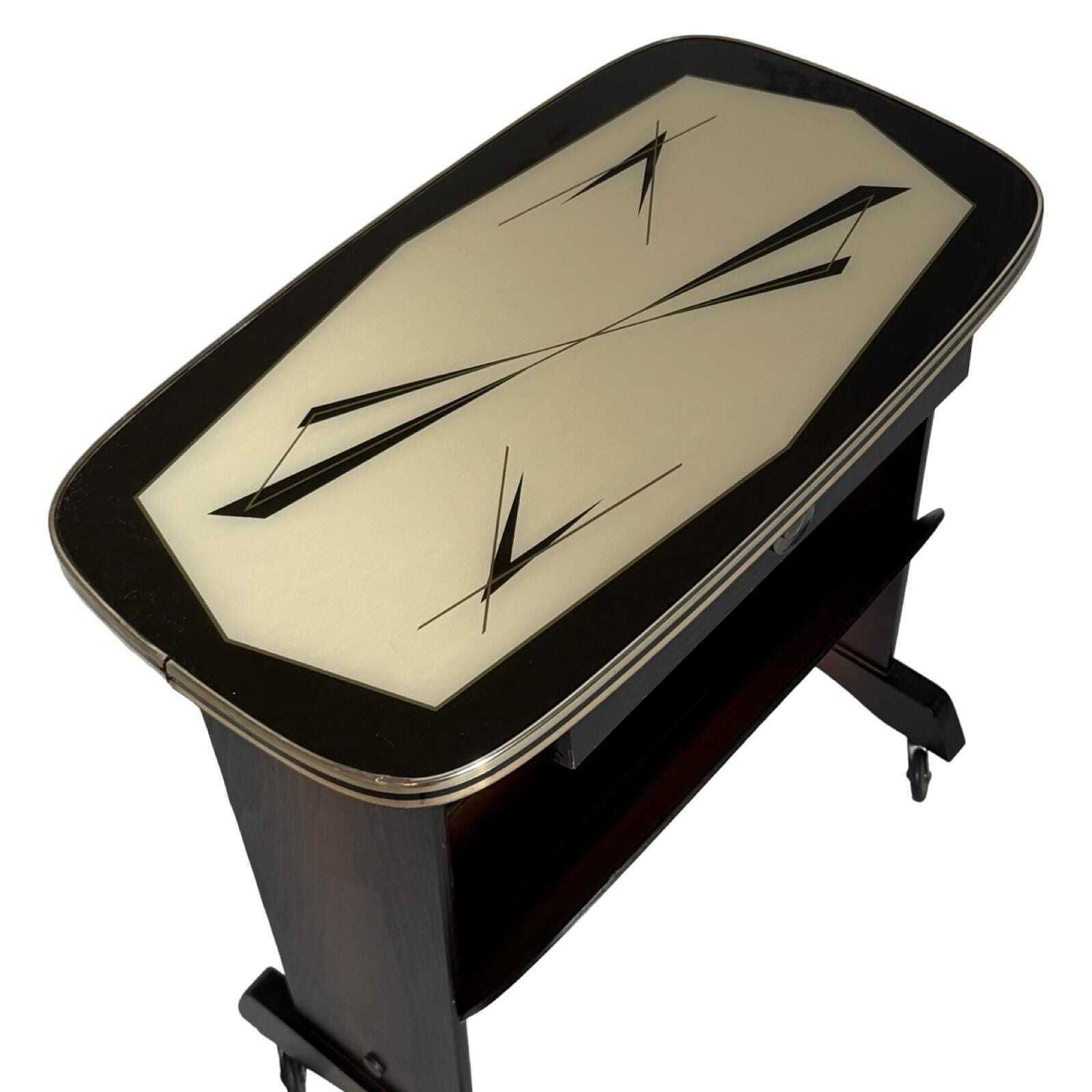 Atomic Age / Aft Deco Style   Newspaper Basket / Magazine Rack   Side Table   Ca. 1950's   With Glass Top, Mounted On Casters photo for sale