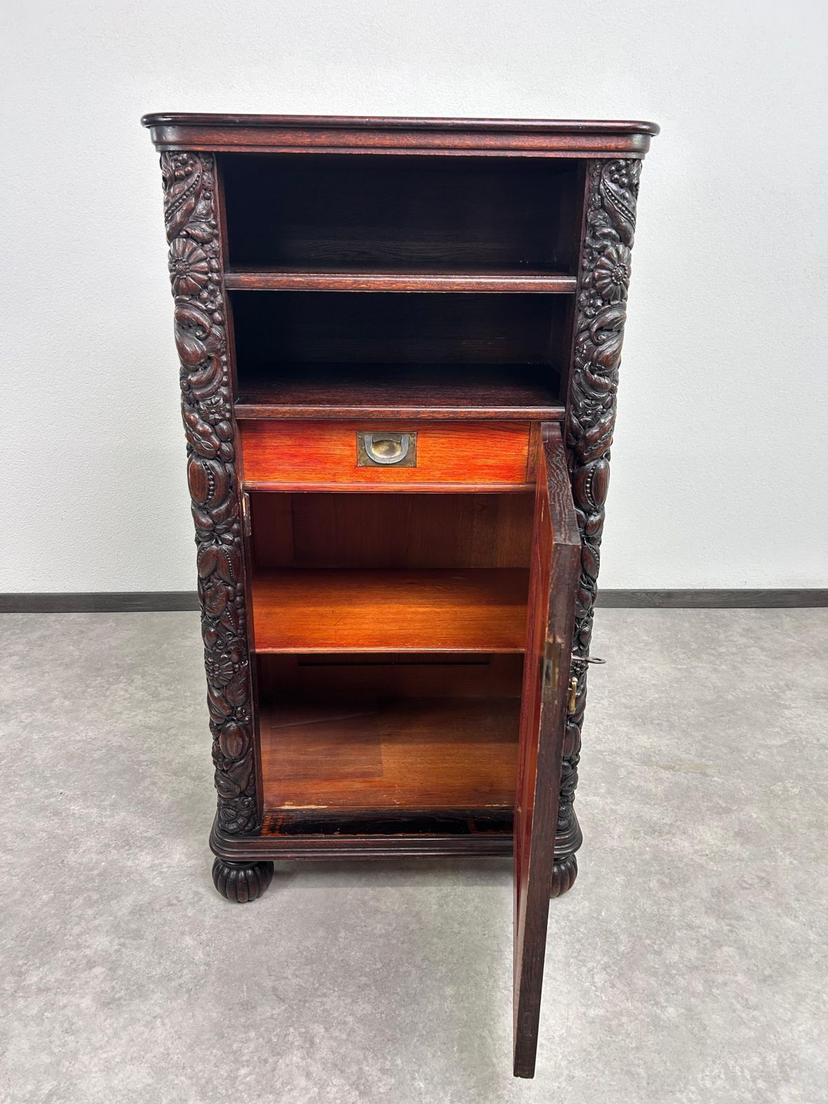 Art Nouveau Cabinet With A Shelf With Distinctive Floral Carvings photo for sale