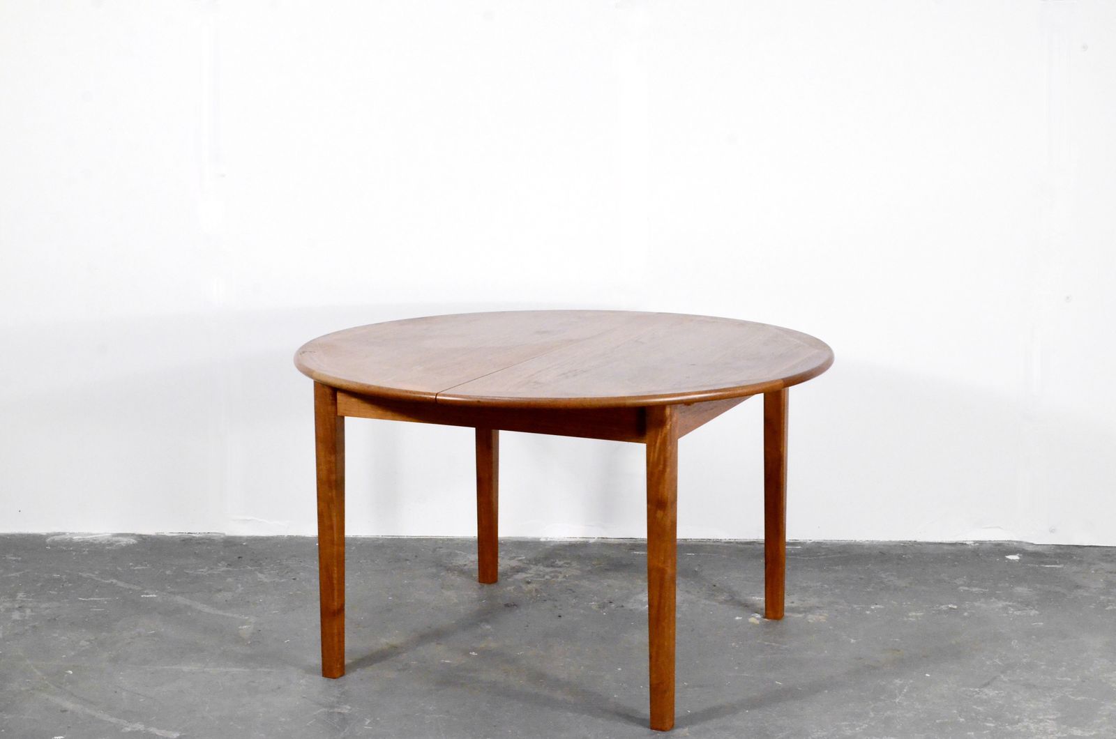photo furniture Midcentury Danish Teak Extending Round Table.