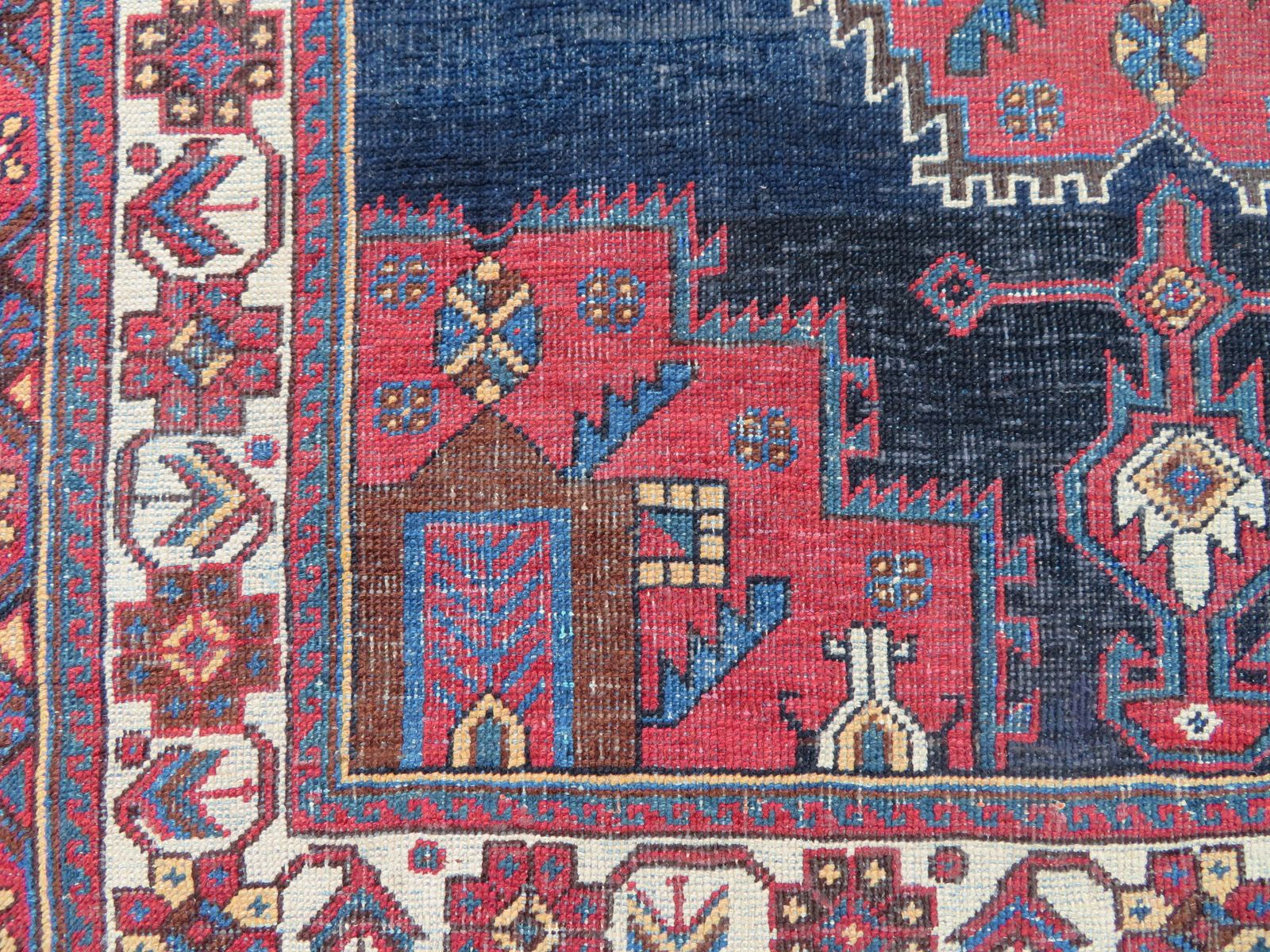 Antique Tribal Rug. 132cm X 114cm. photo Textiles