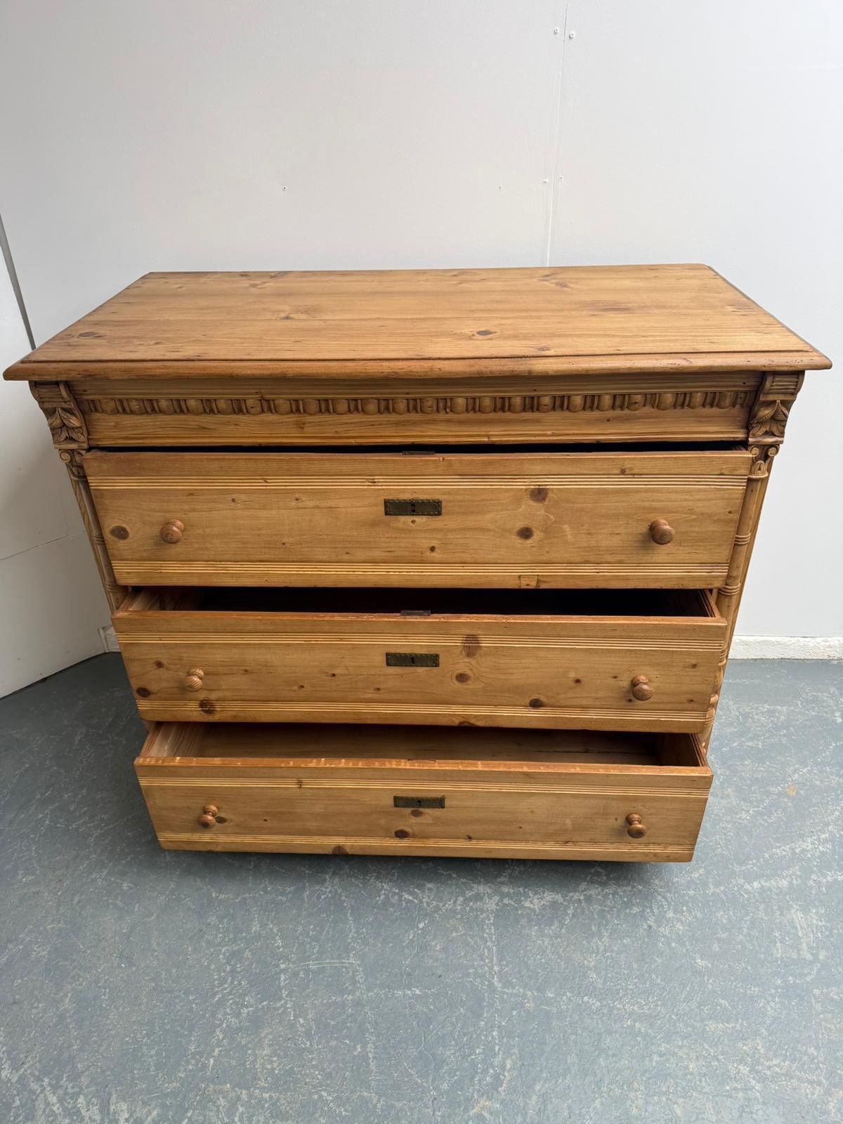 An Original Antique Pine Columned Hungarian Waxed 3 Drawer Chest Of Drawers photo vinterior