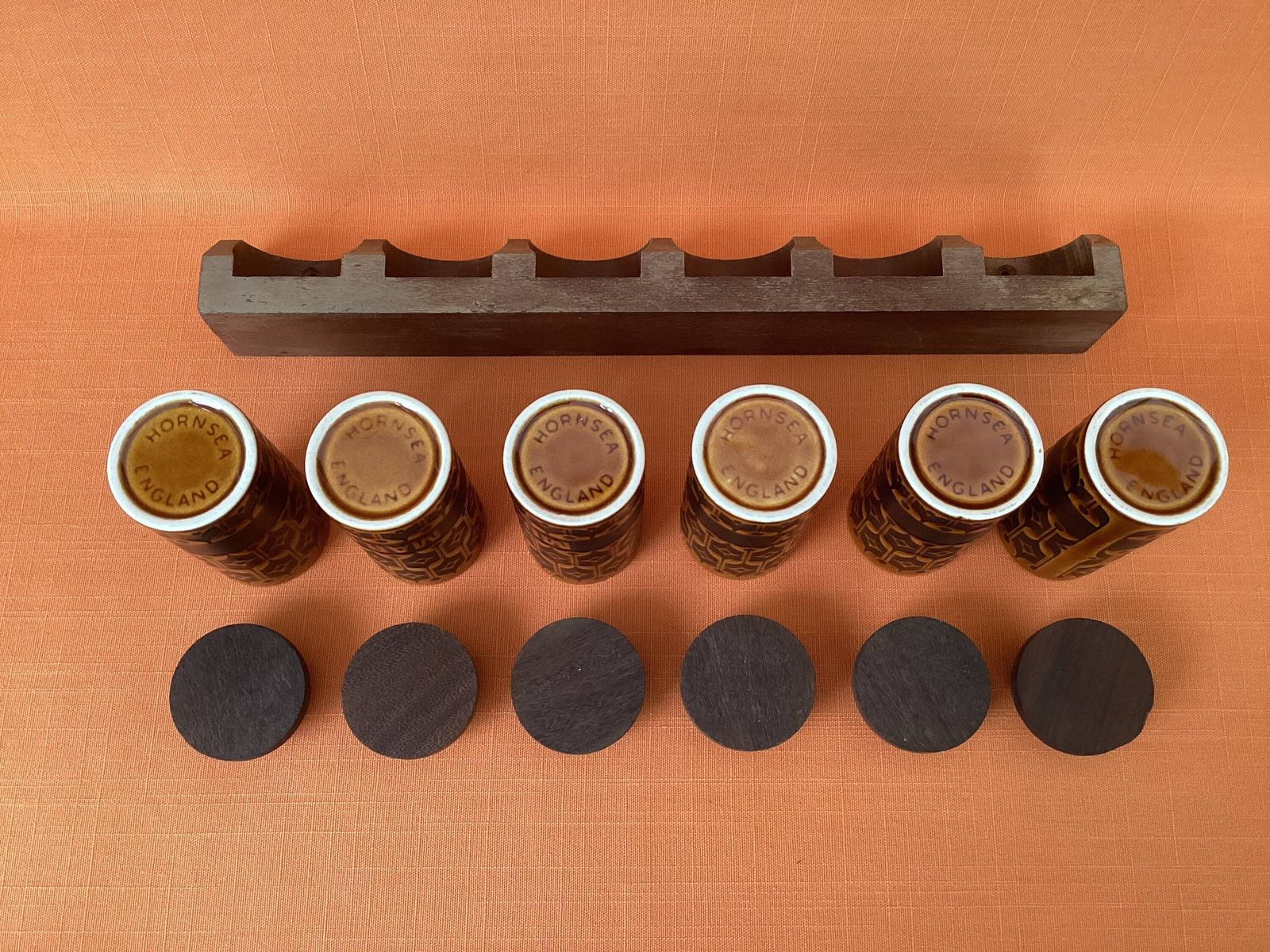 1970s Hornsea Heirloom Spice Rack With 6 Tall Labelled Spice Jars In Autumn Brown photo vintage